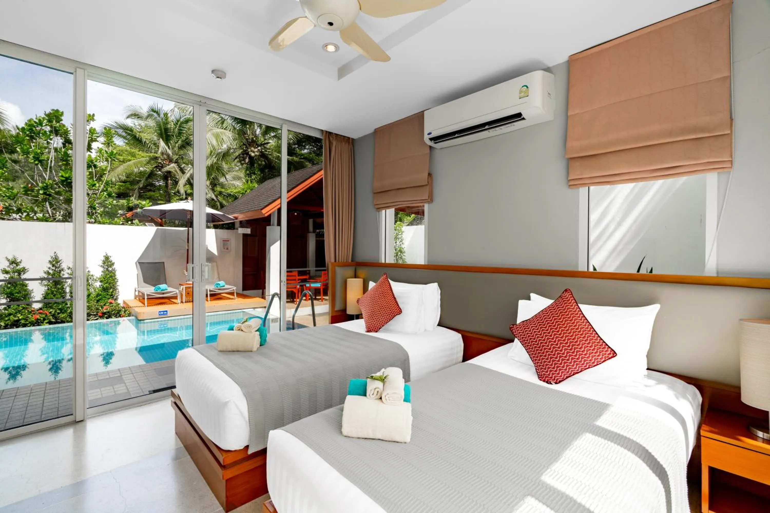 Bed in Apsara Beachfront Resort & Villa