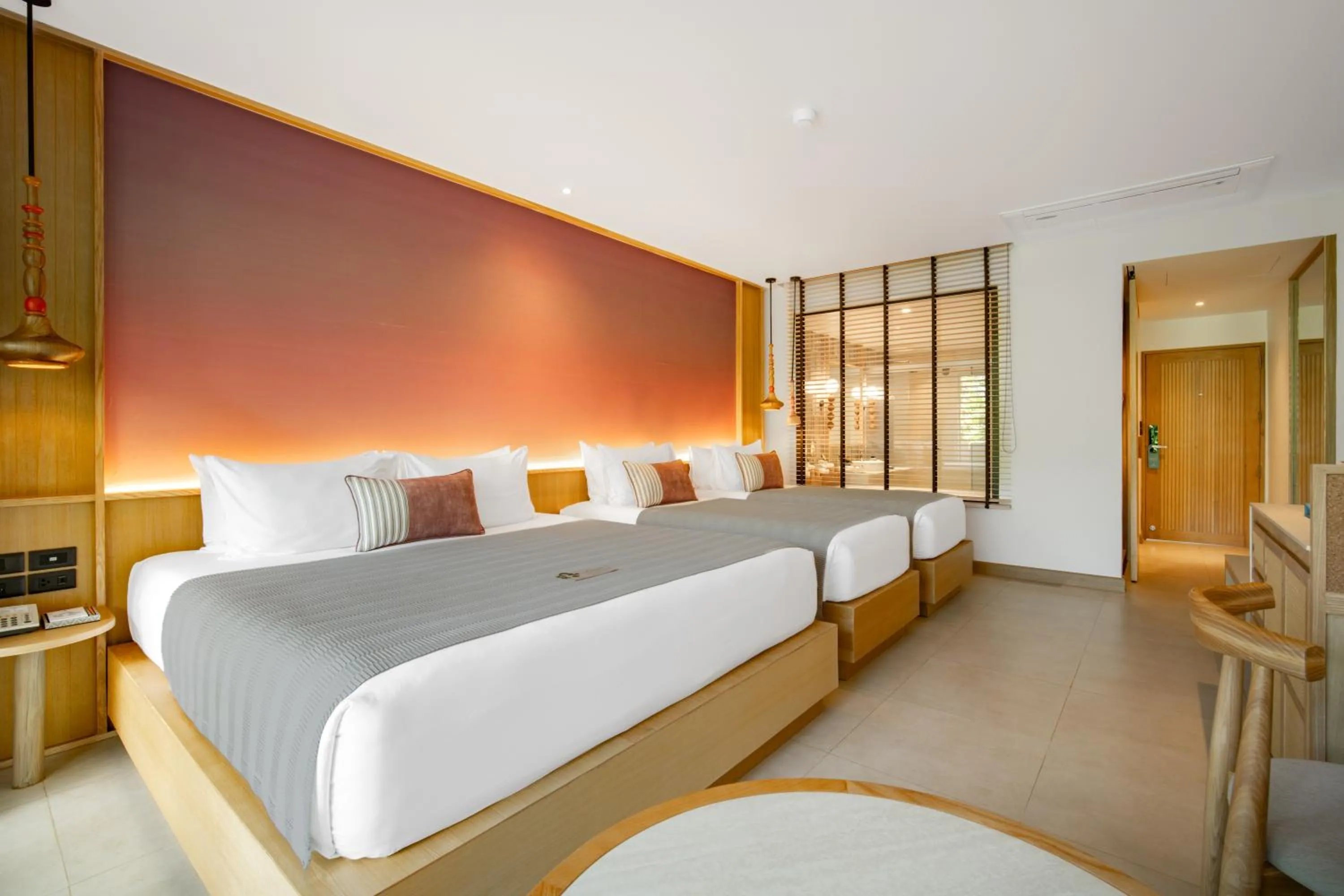 Bed in Apsara Beachfront Resort & Villa