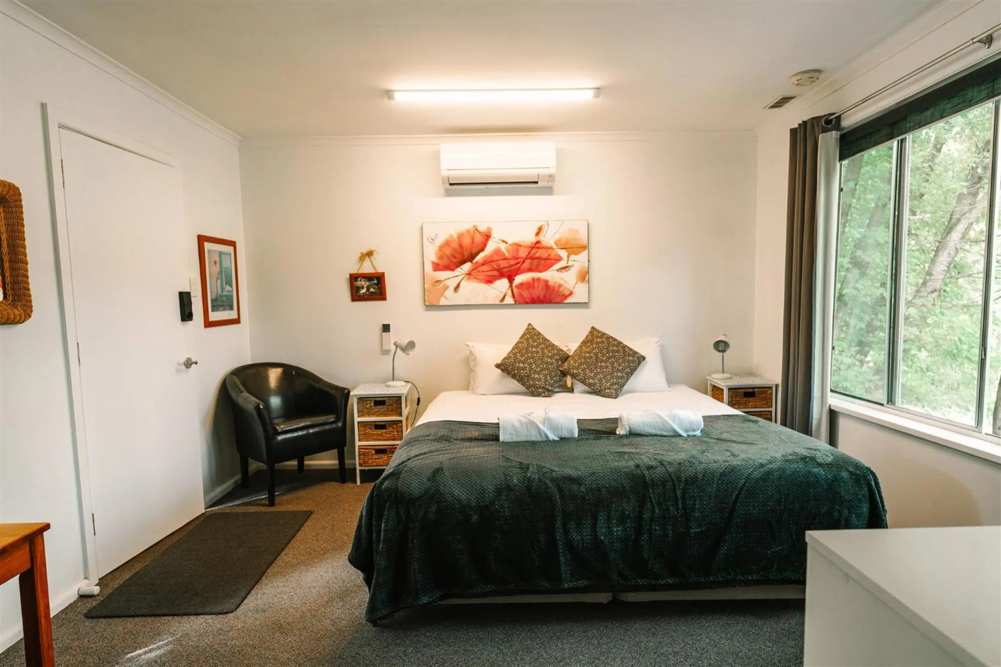 Bed in Alpine Riverside Cottages