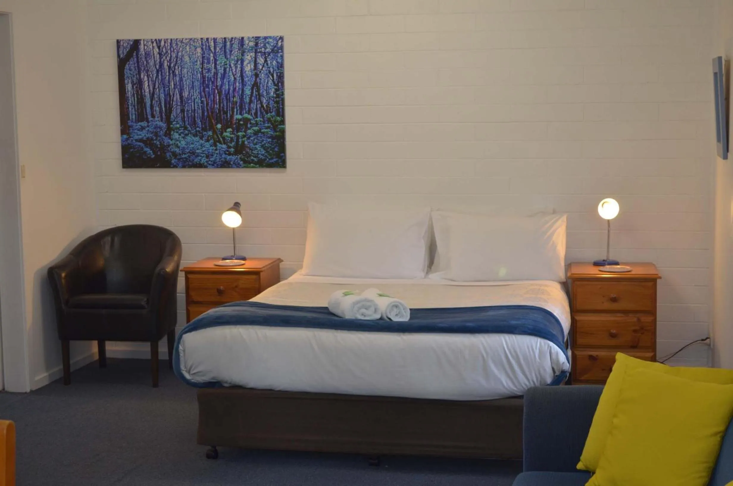 Bed in Alpine Riverside Cottages