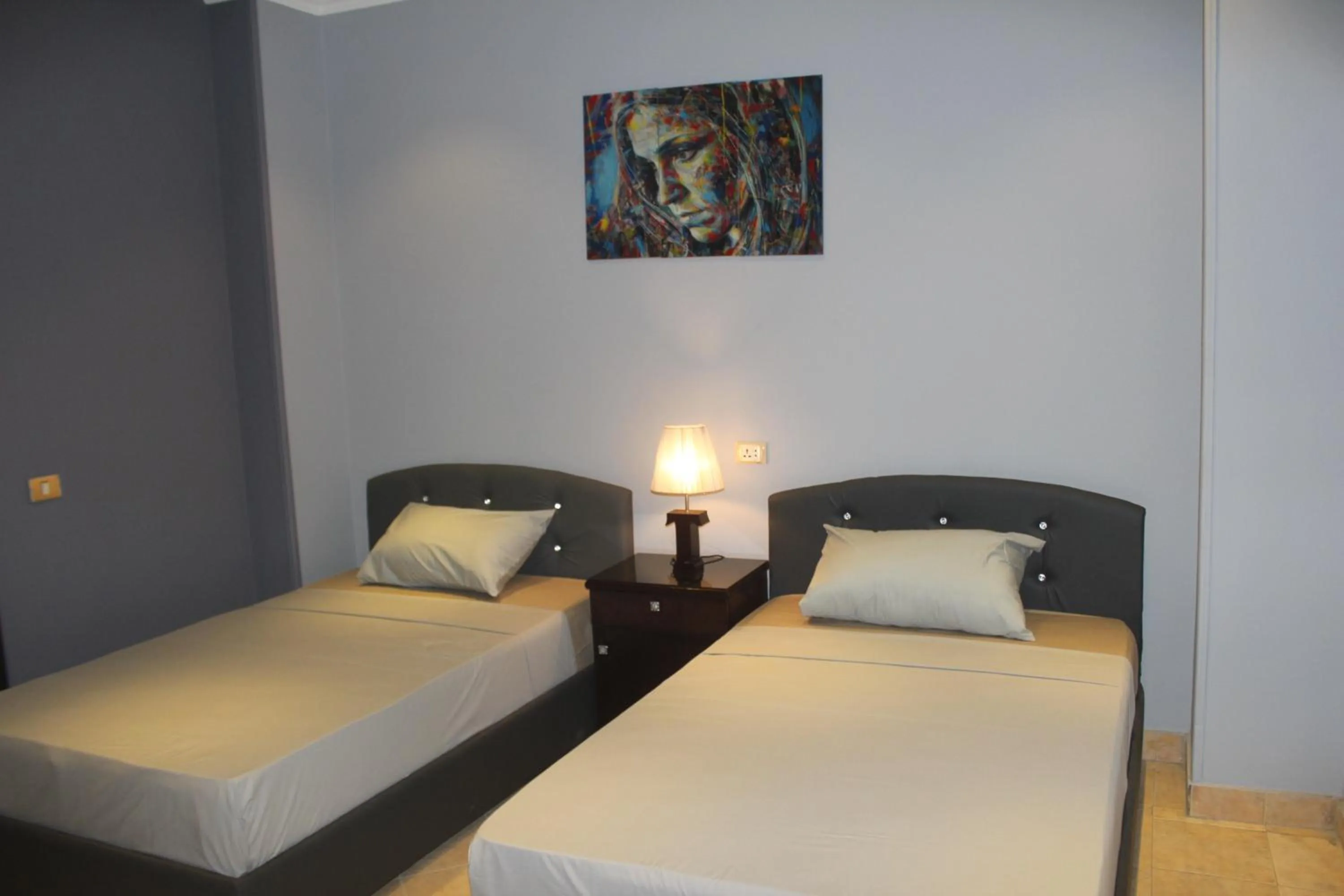 Photo of the whole room, Bed in Tahrir Square Hostel