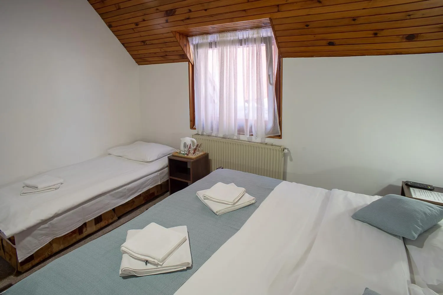 Photo of the whole room, Bed in MB Hotel