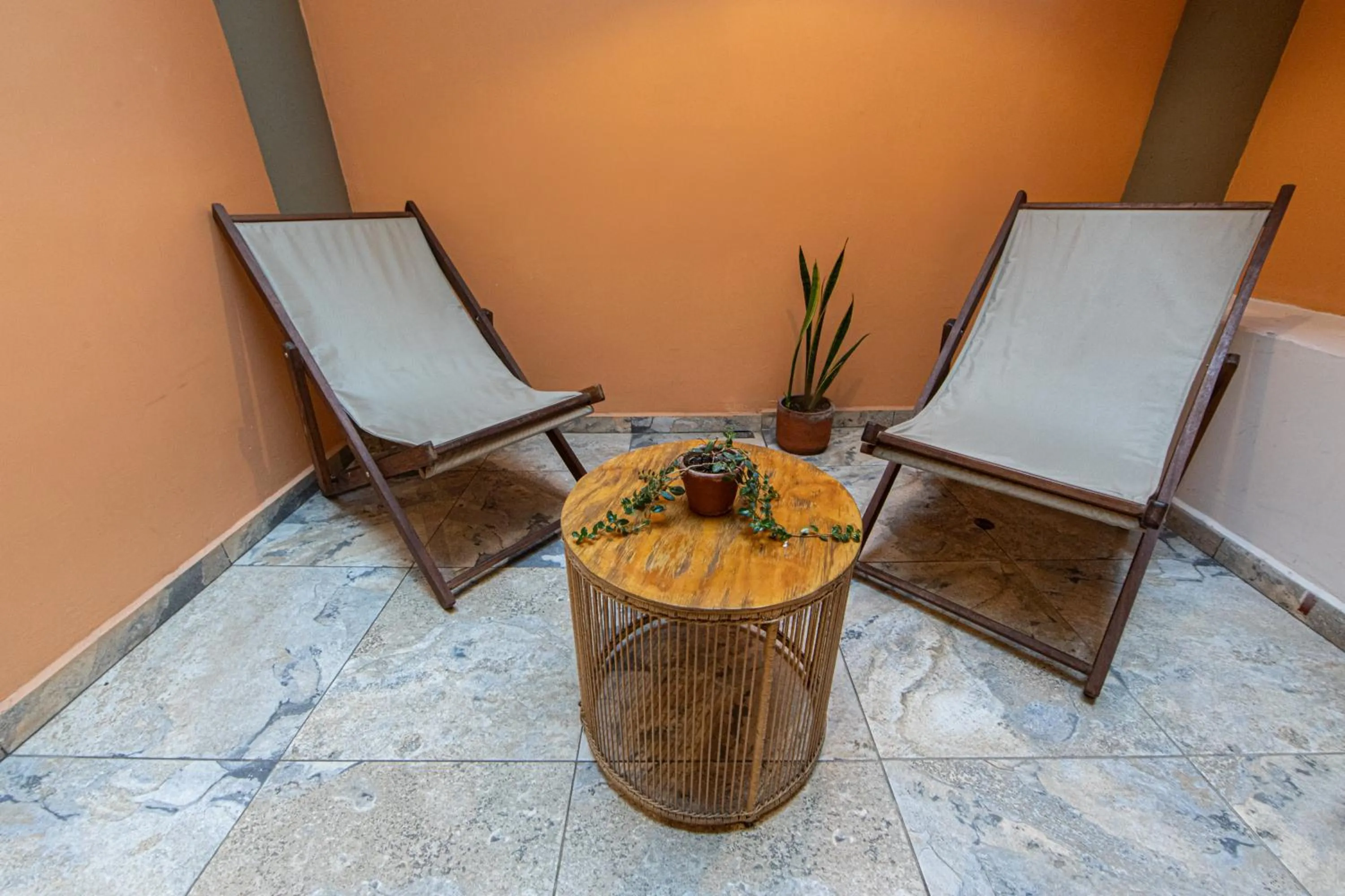Seating area in La Martina Boutique Hotel