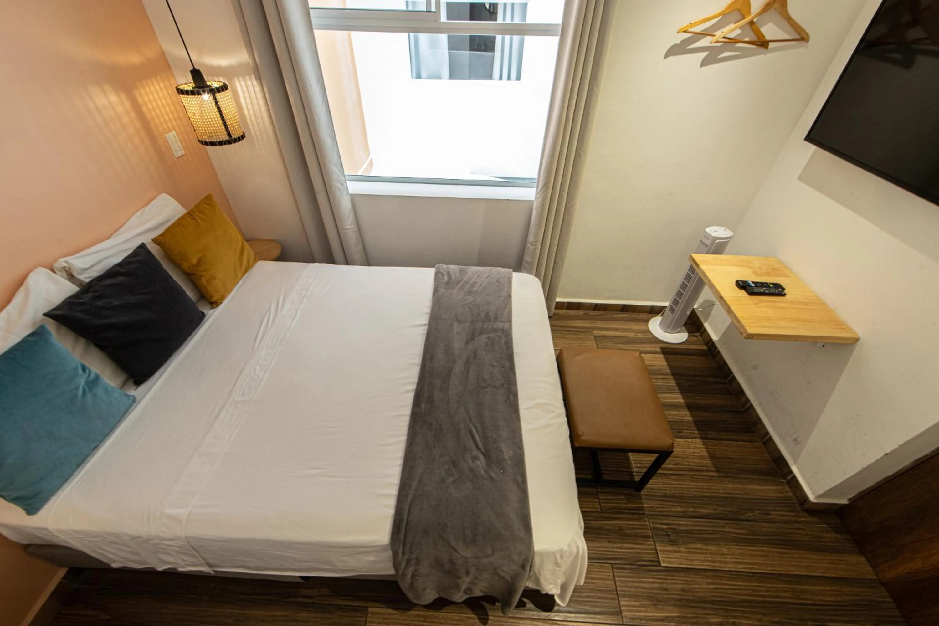 Bed in La Martina Boutique Hotel