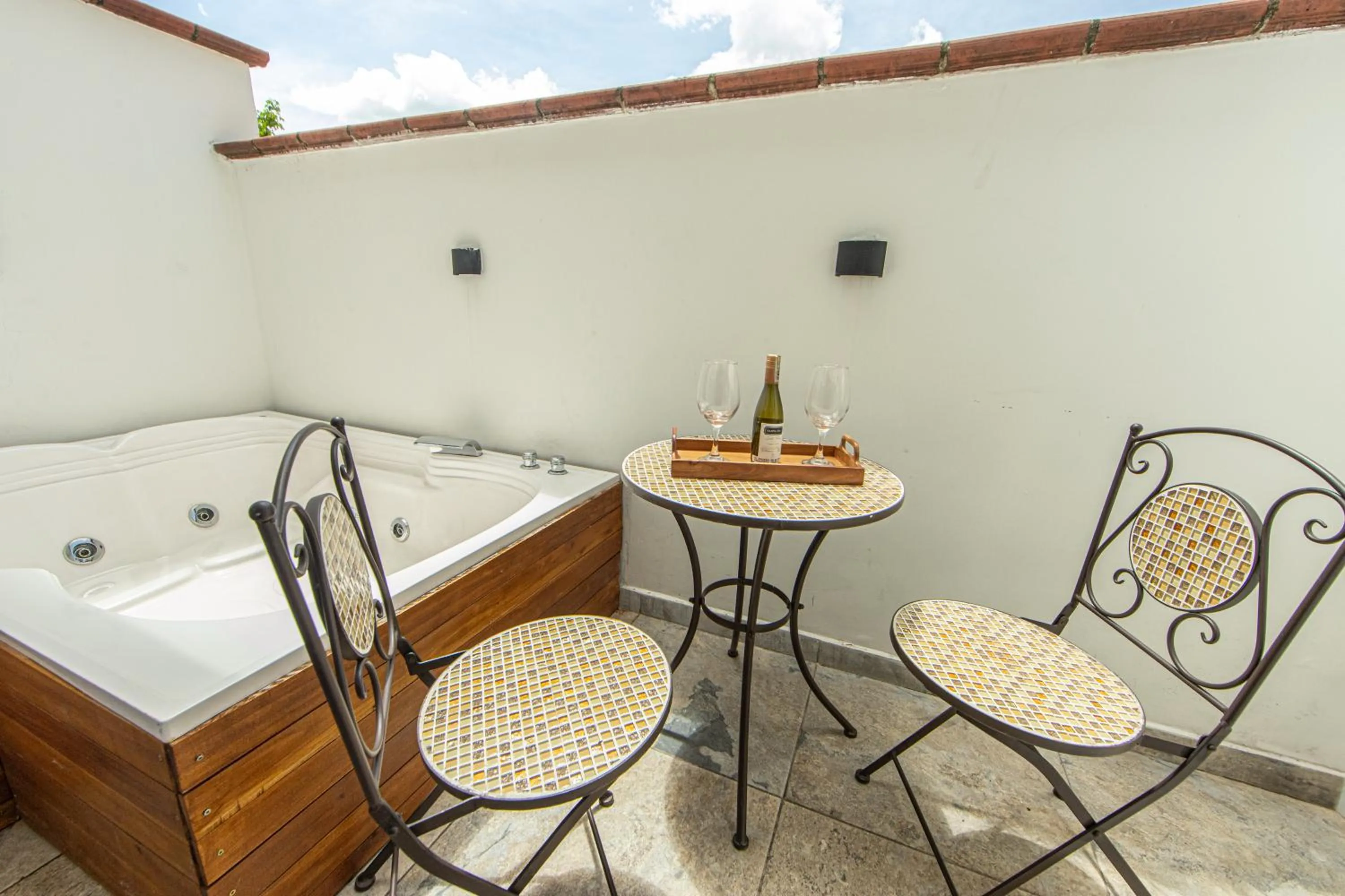 Patio, Bed in La Martina Boutique Hotel