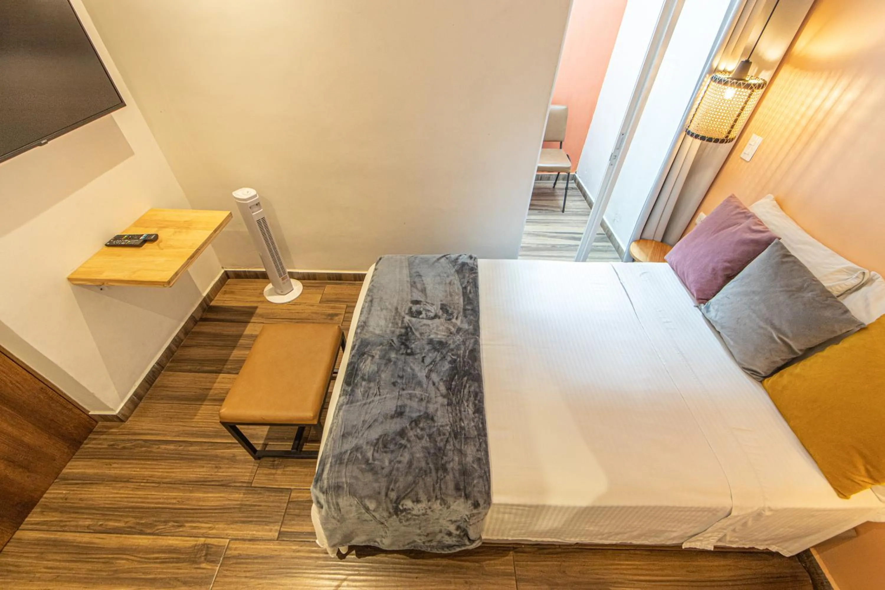 Bed in La Martina Boutique Hotel