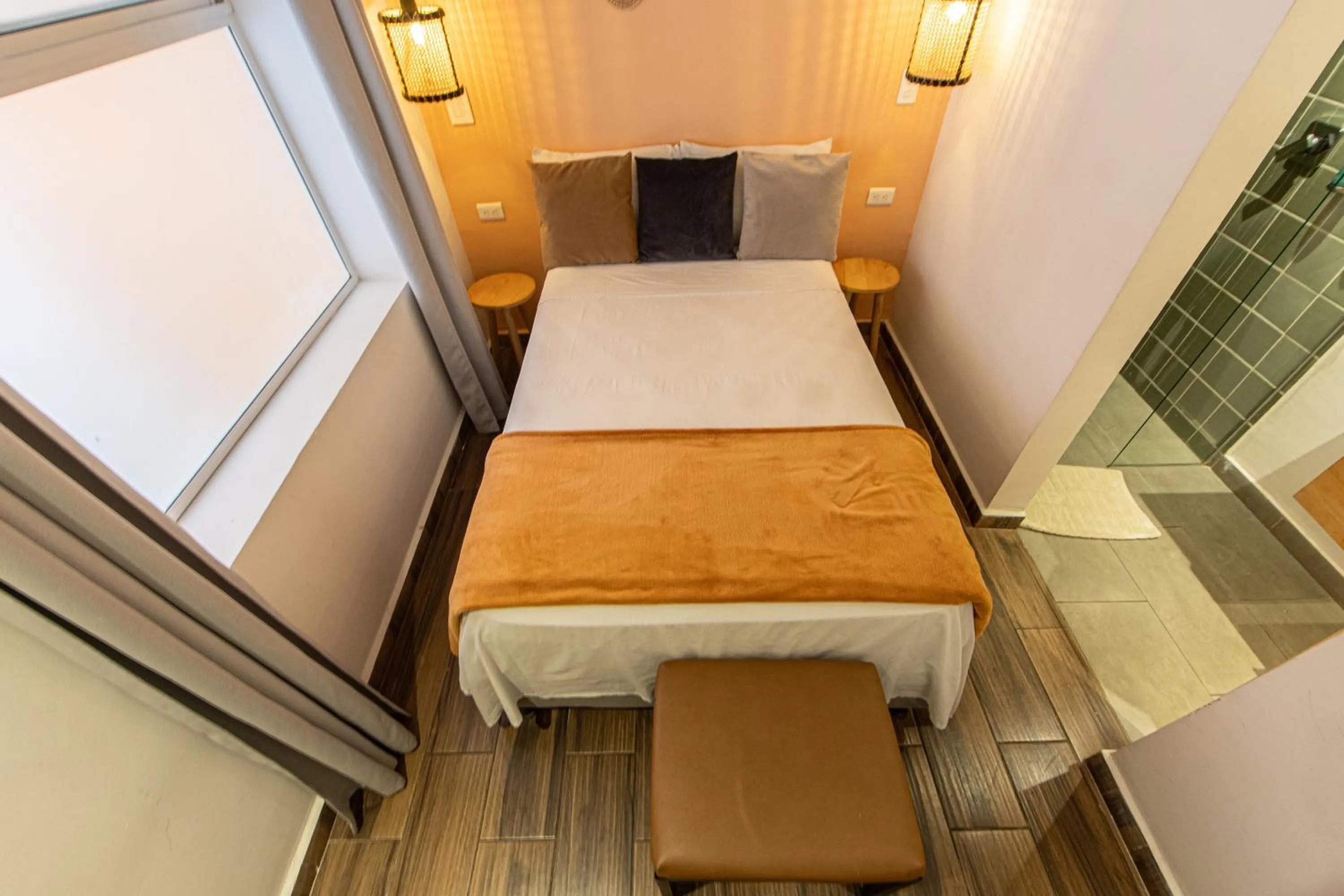 Bed in La Martina Boutique Hotel