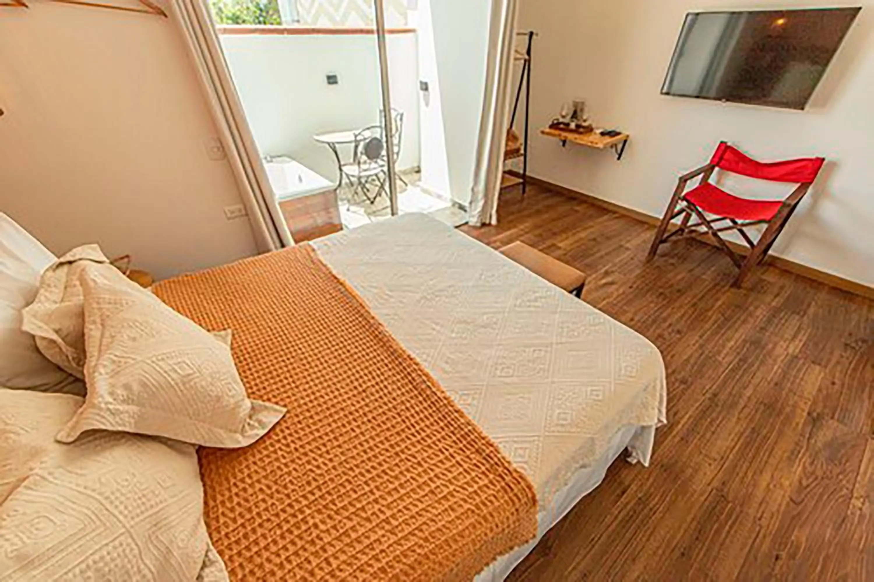 Bed in La Martina Boutique Hotel