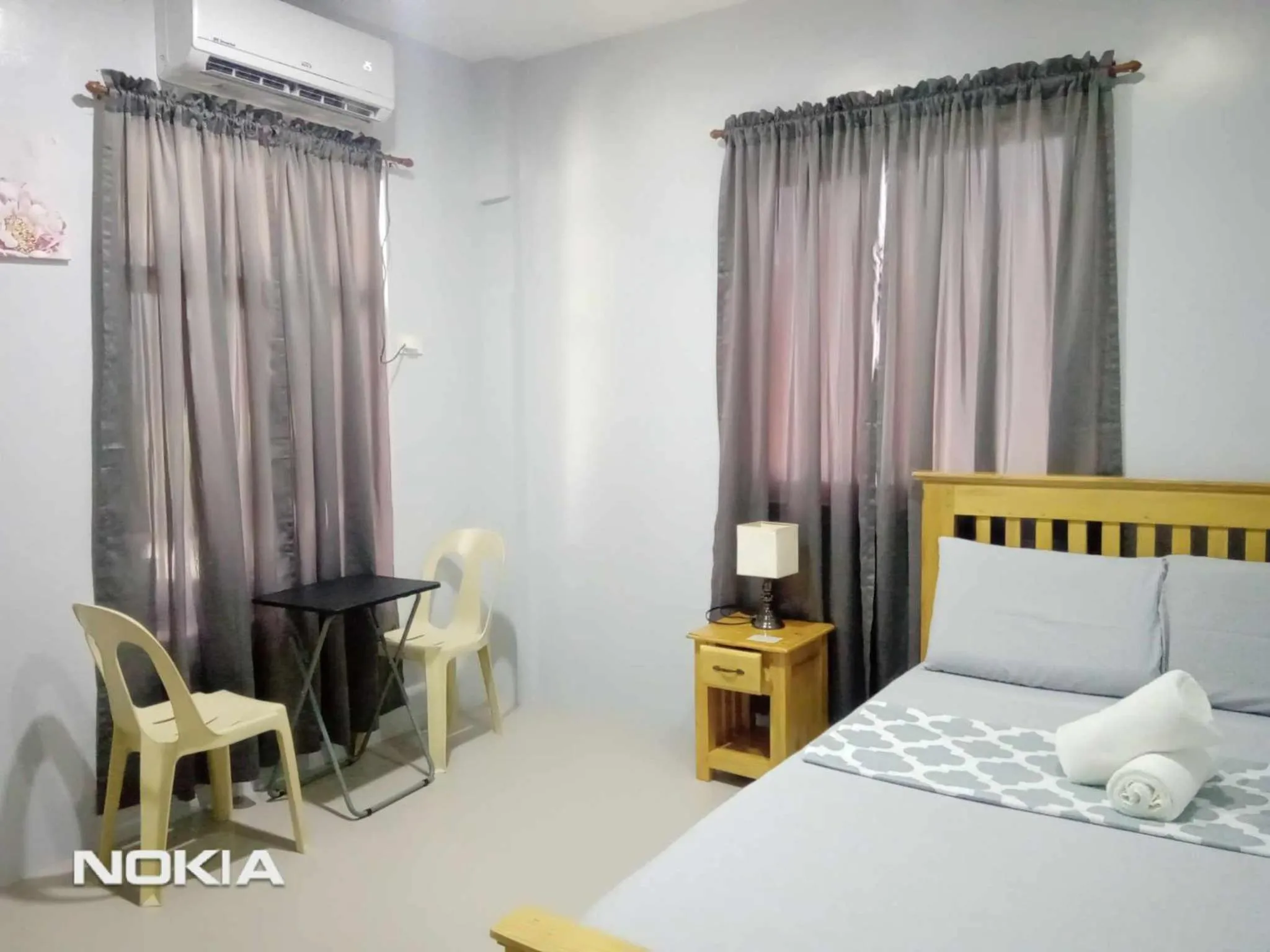 Bed in Grae’s Apartelle