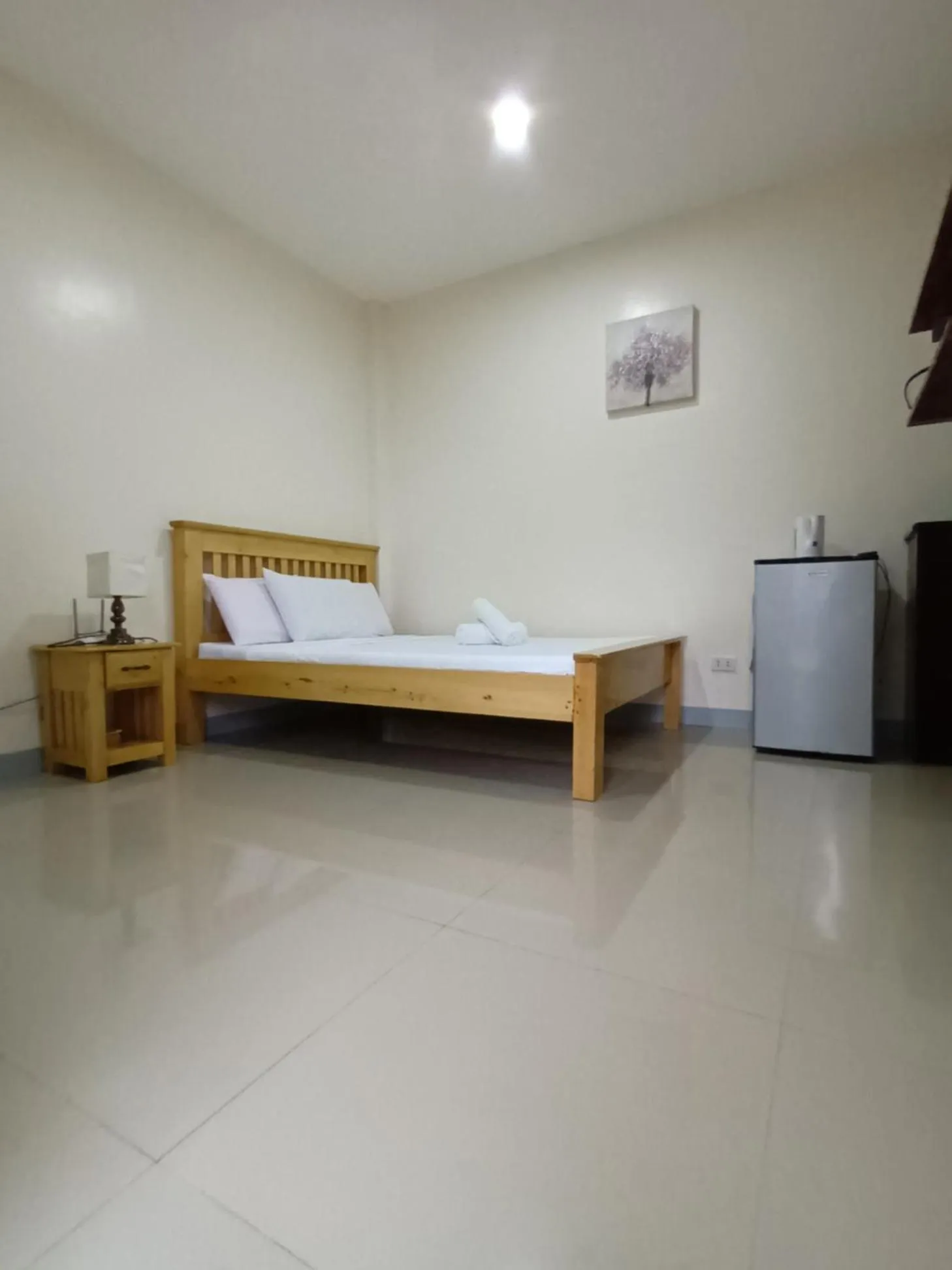 Bed in Grae’s Apartelle