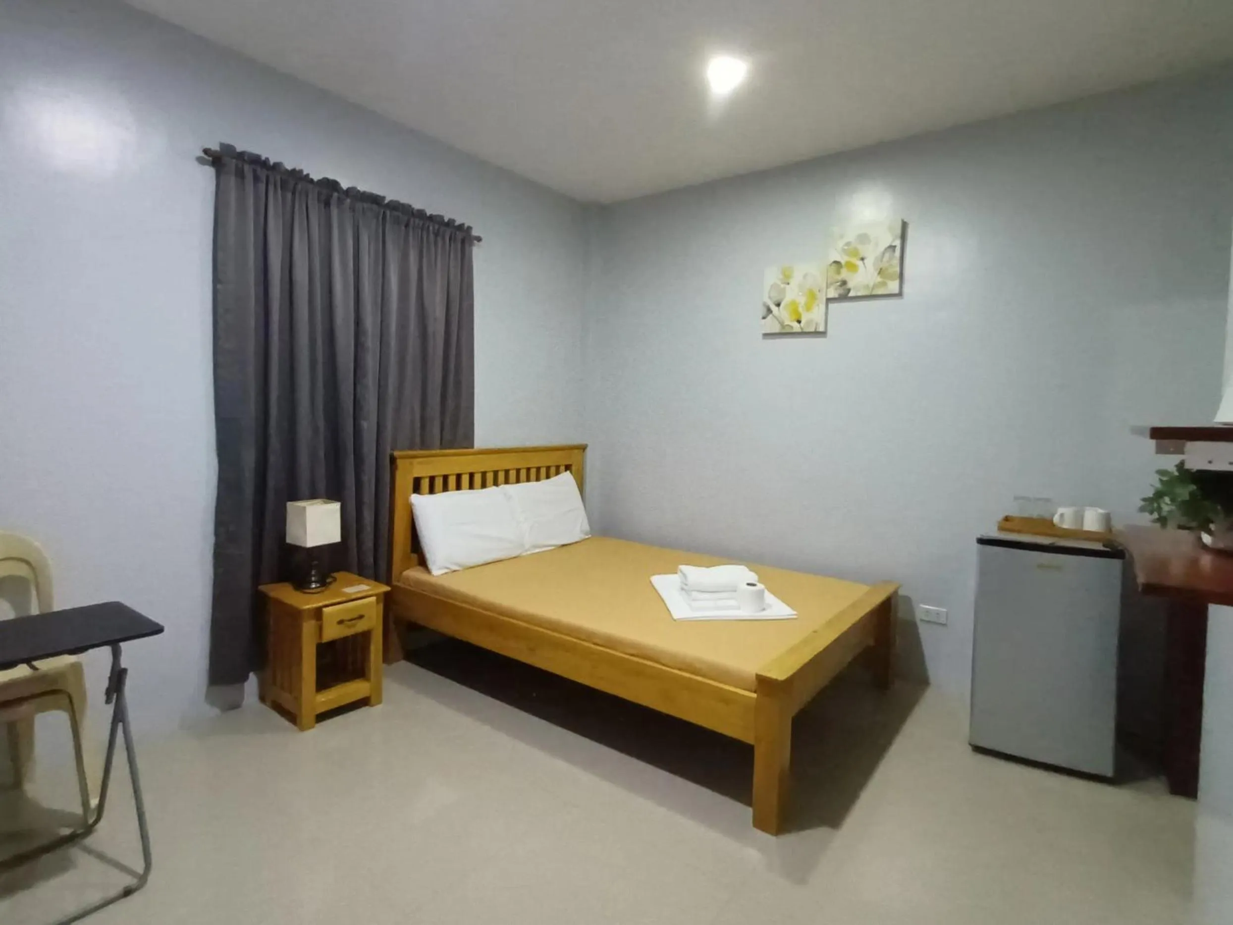 Bed in Grae’s Apartelle