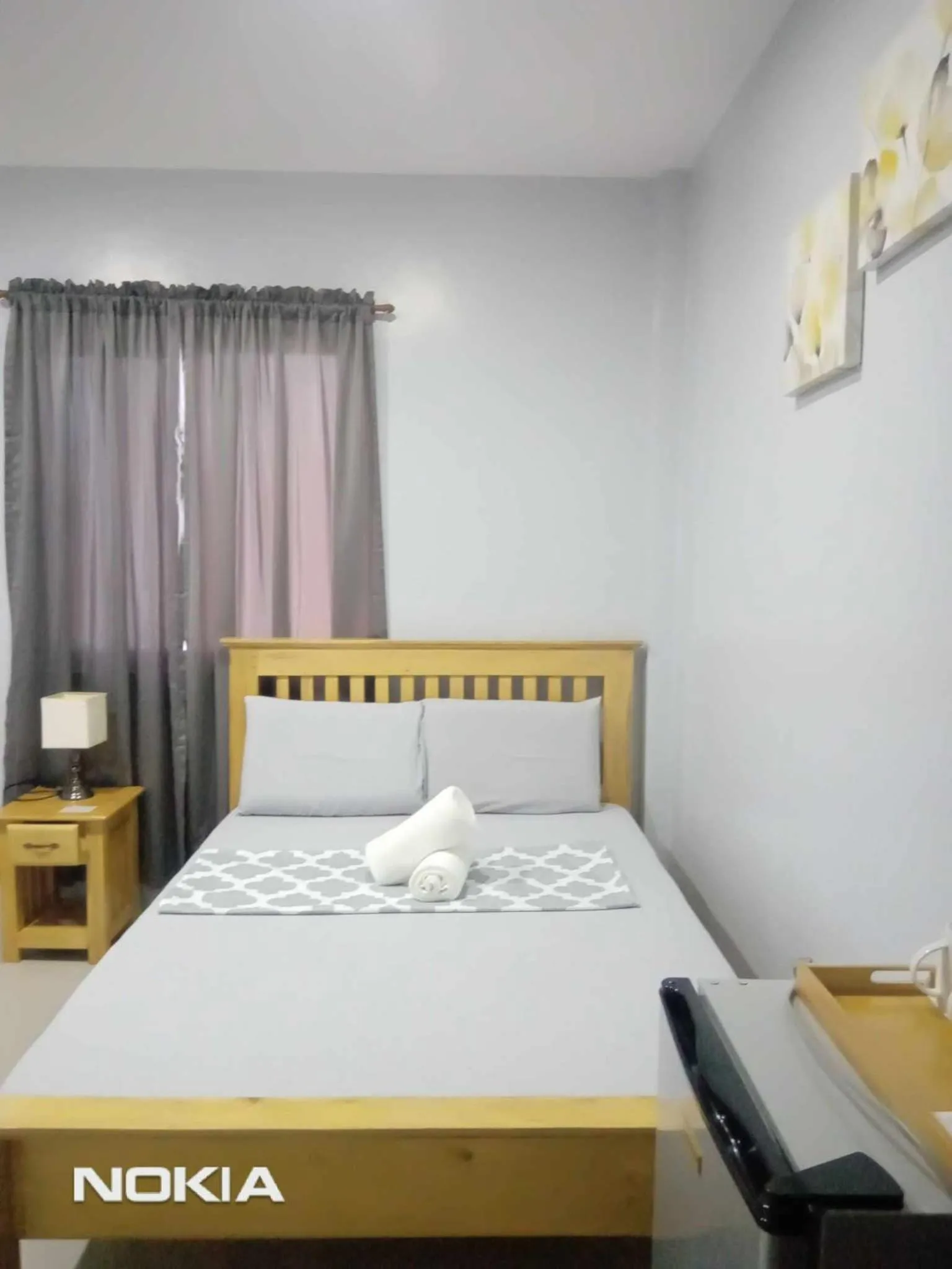 Bed in Grae’s Apartelle