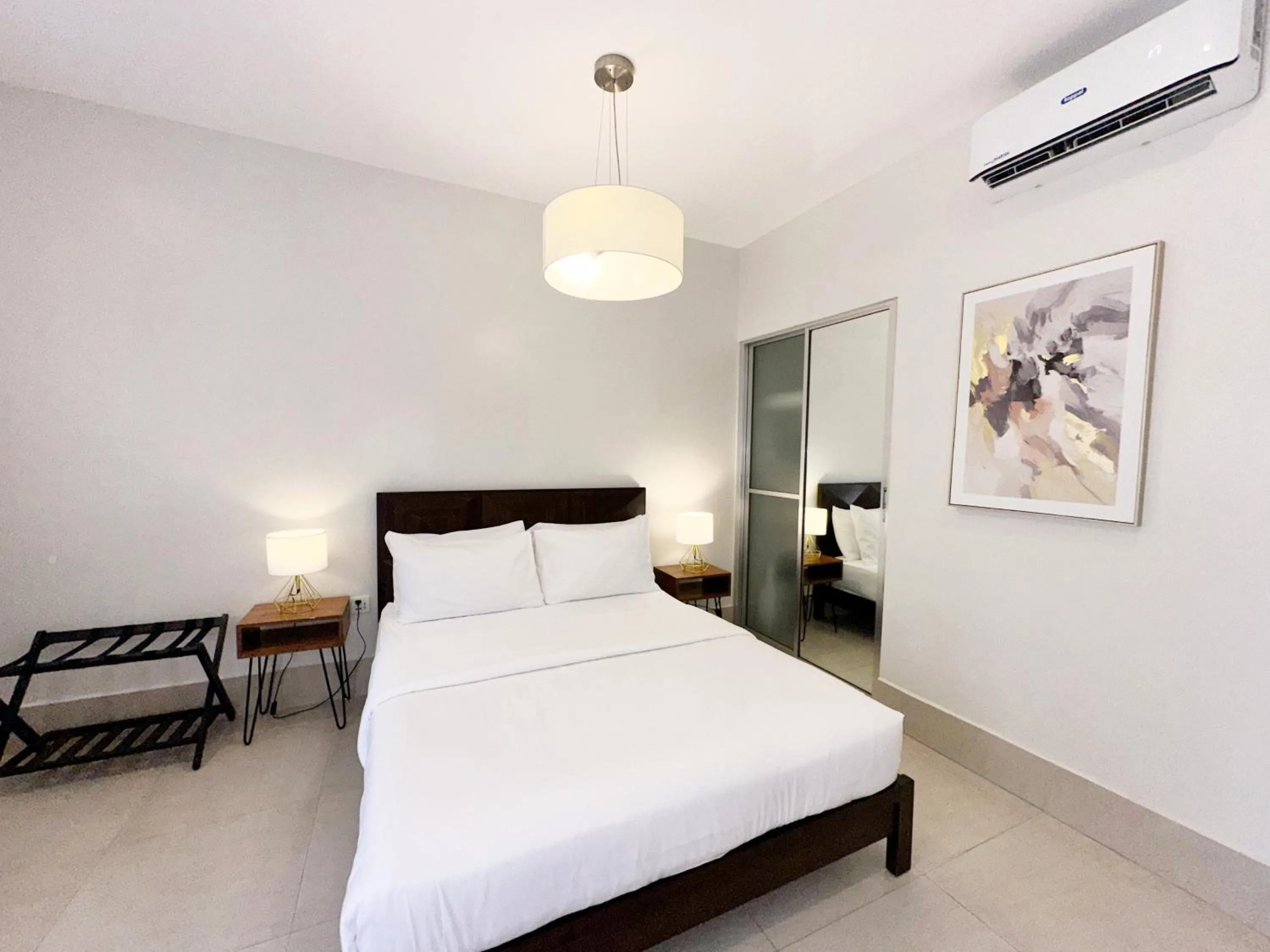 Bed in HARMAN SUITES Moalboal