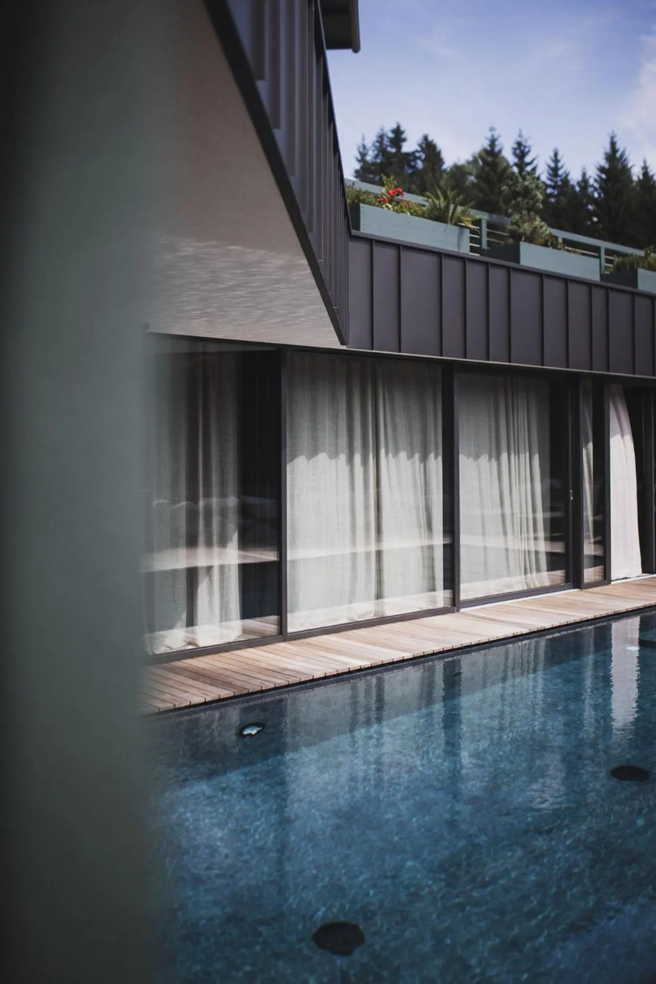 Swimming pool in Nancy's Holiday Homes Dolomites