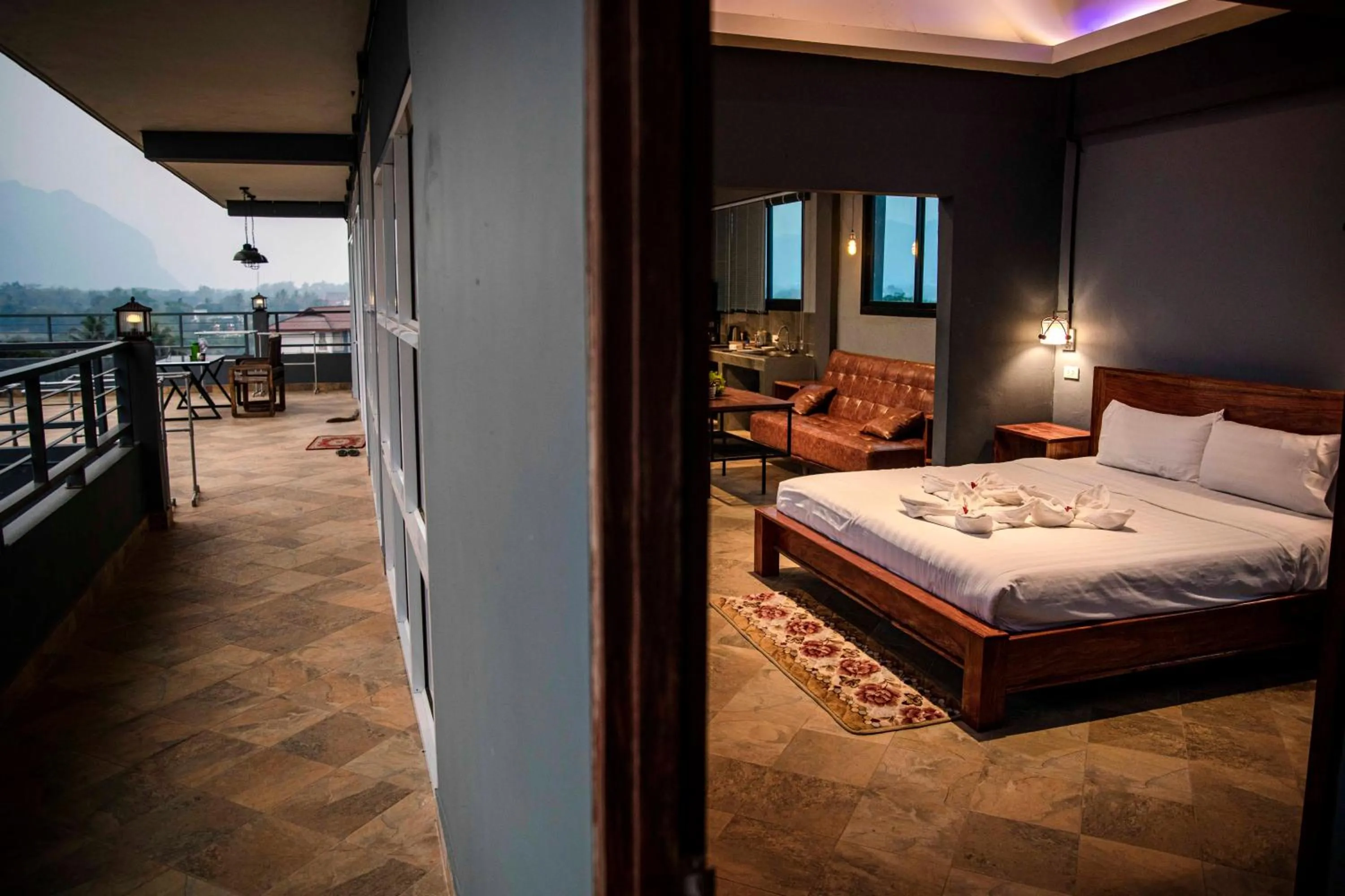 Bed in FARAWAY SUITES