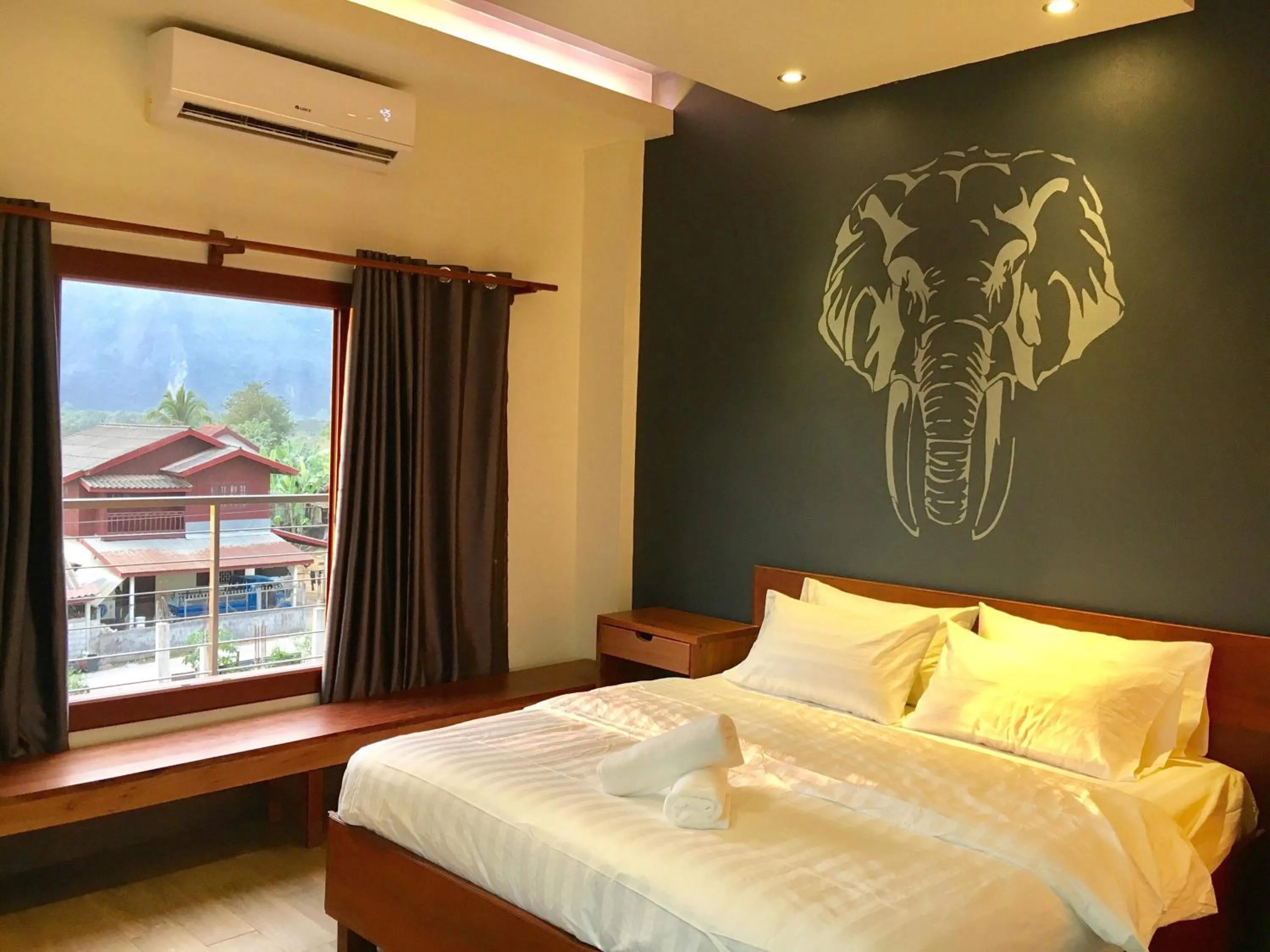 Bed in FARAWAY SUITES