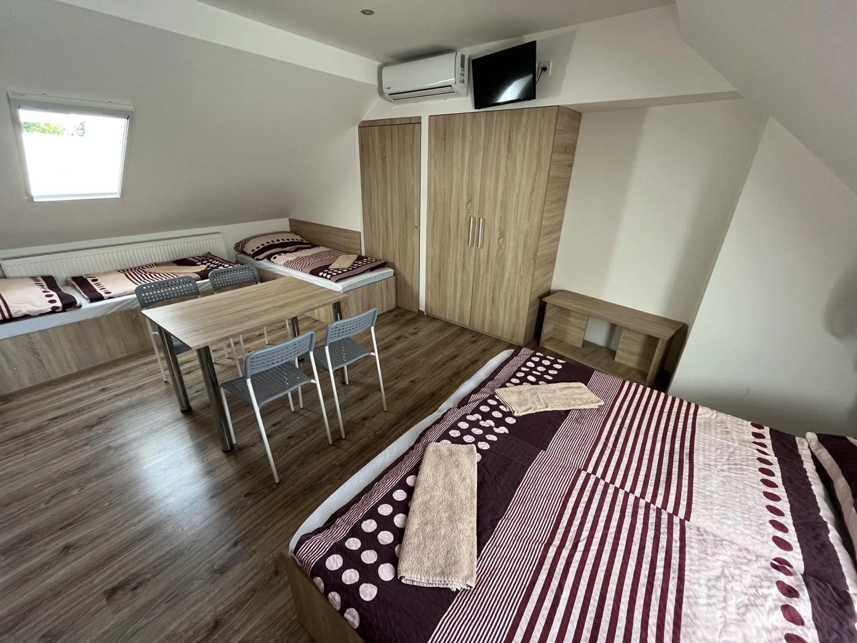 Bed in SUNNY Apartman