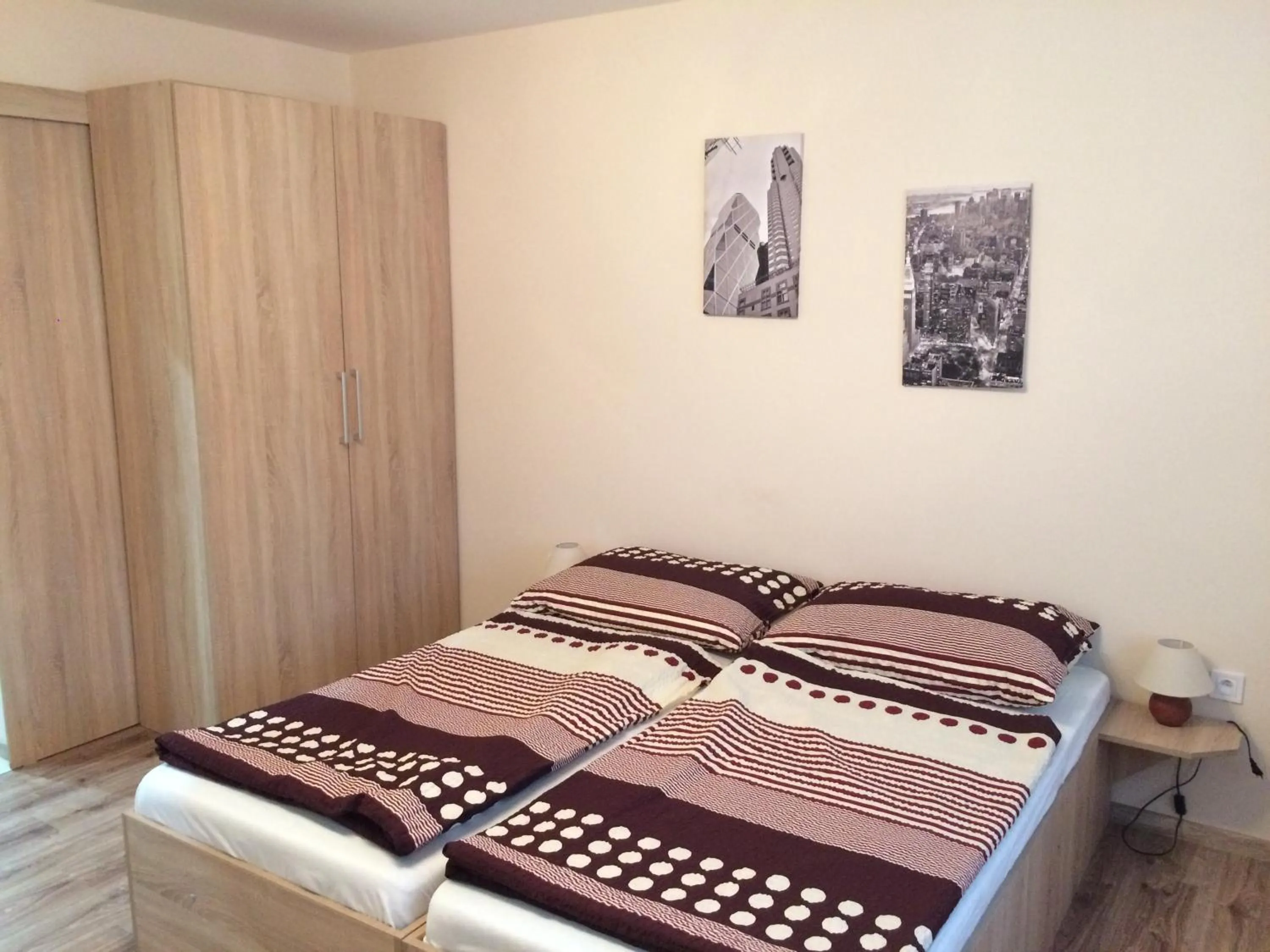 Bed in SUNNY Apartman