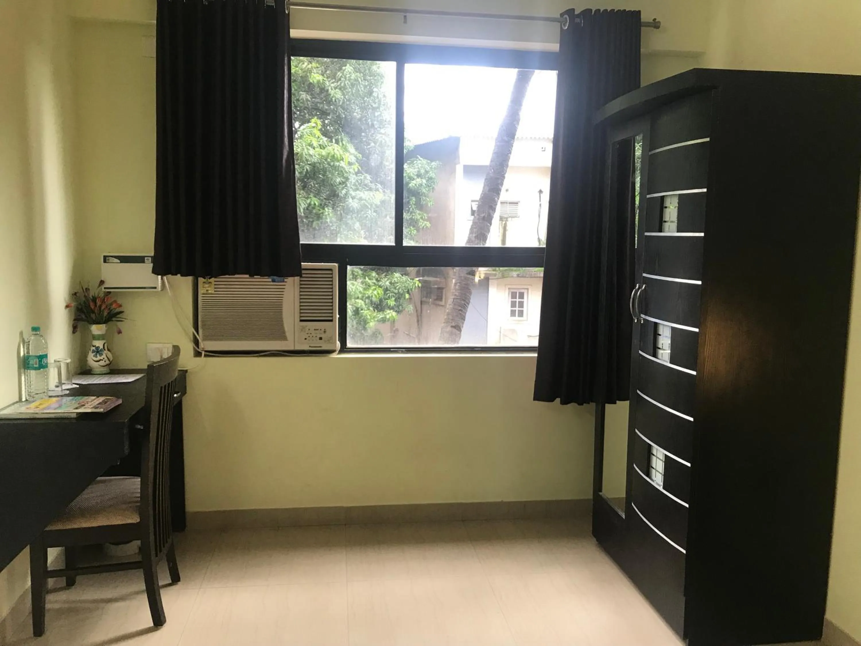 air conditioner in All Seasons Guest House I Rooms & Dorms