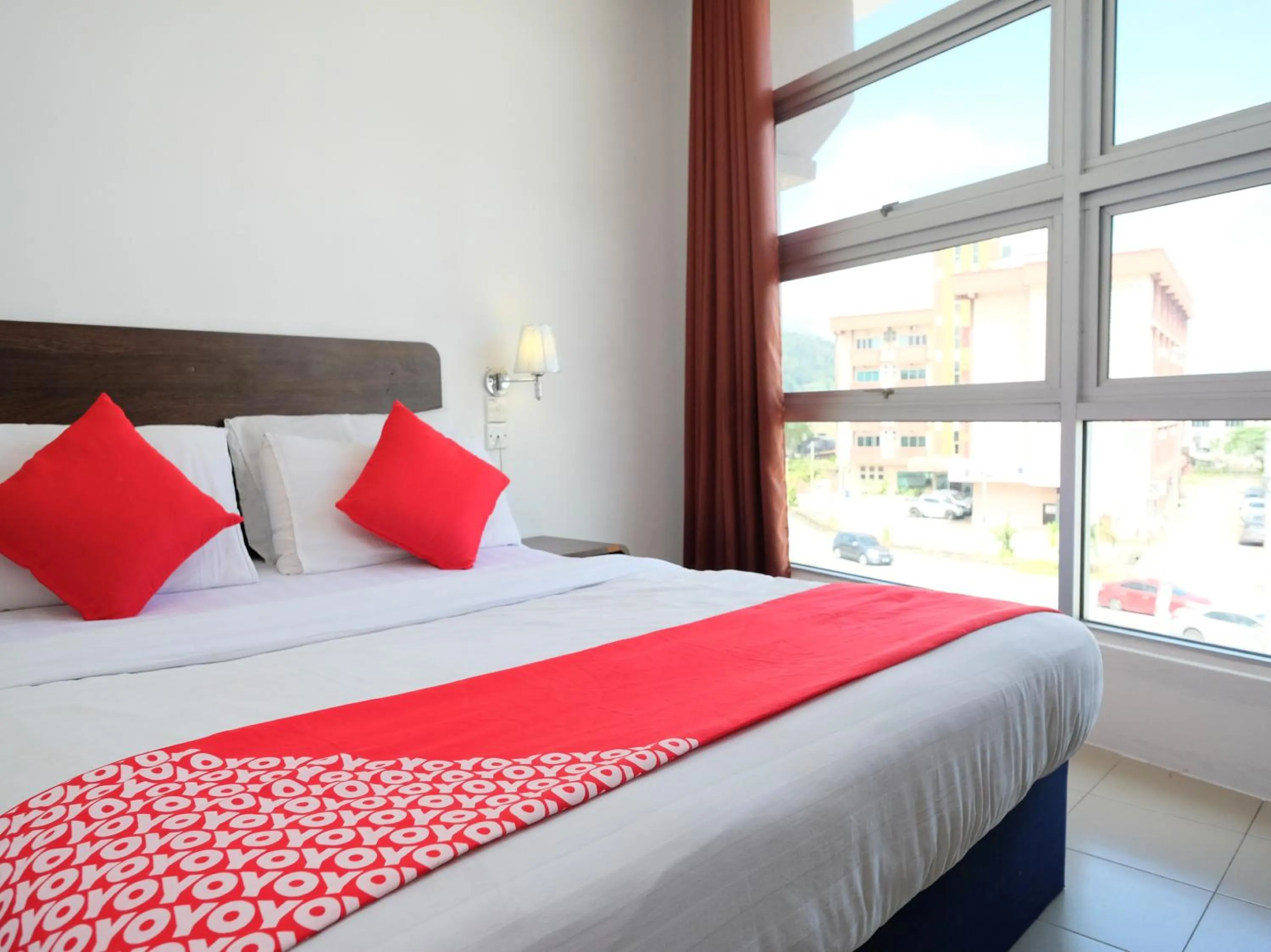 Bedroom in OYO 619 Grand City Hotel 2