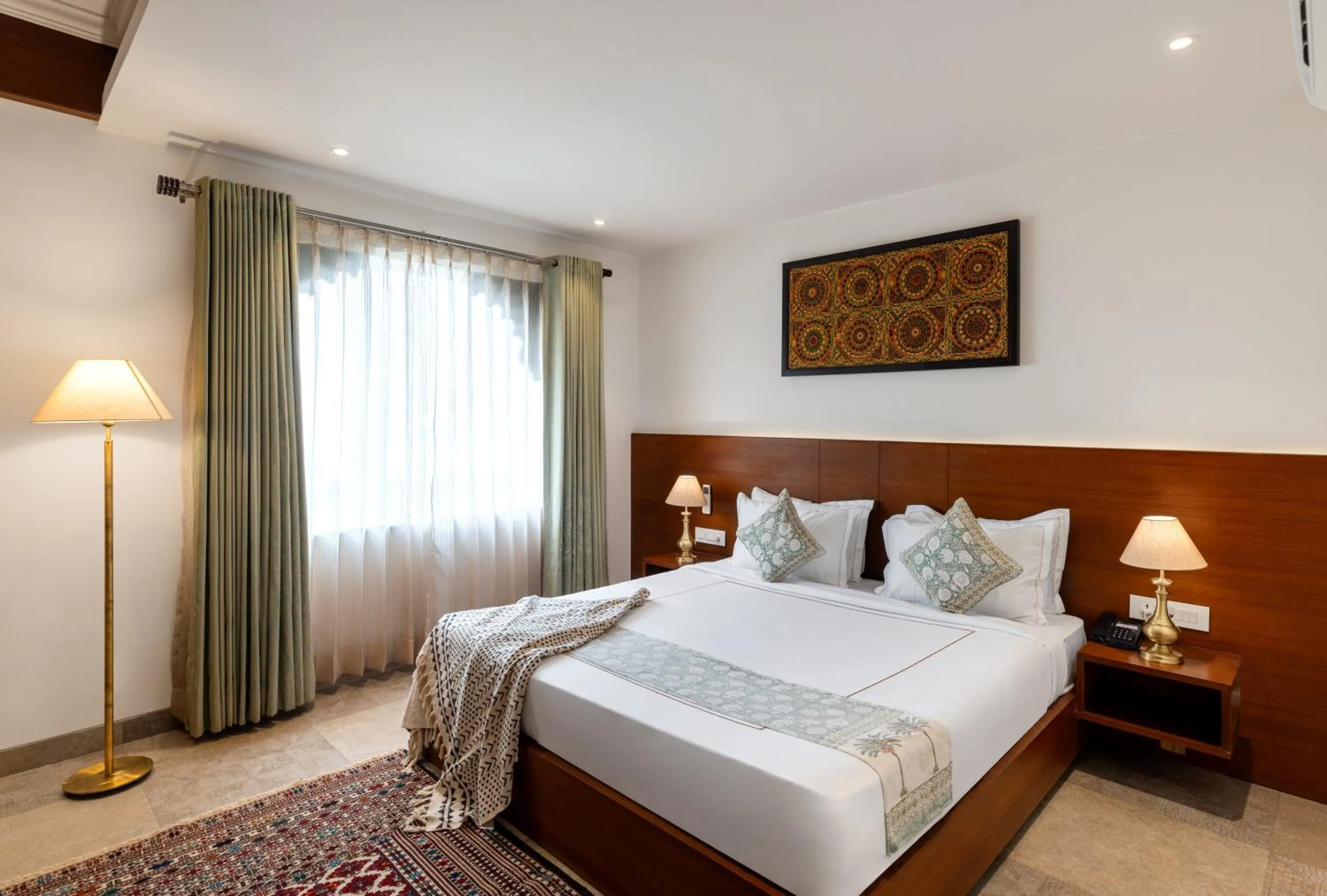 Bed in The Ramvilas - A Rooftop Pichola Lake View Hotel