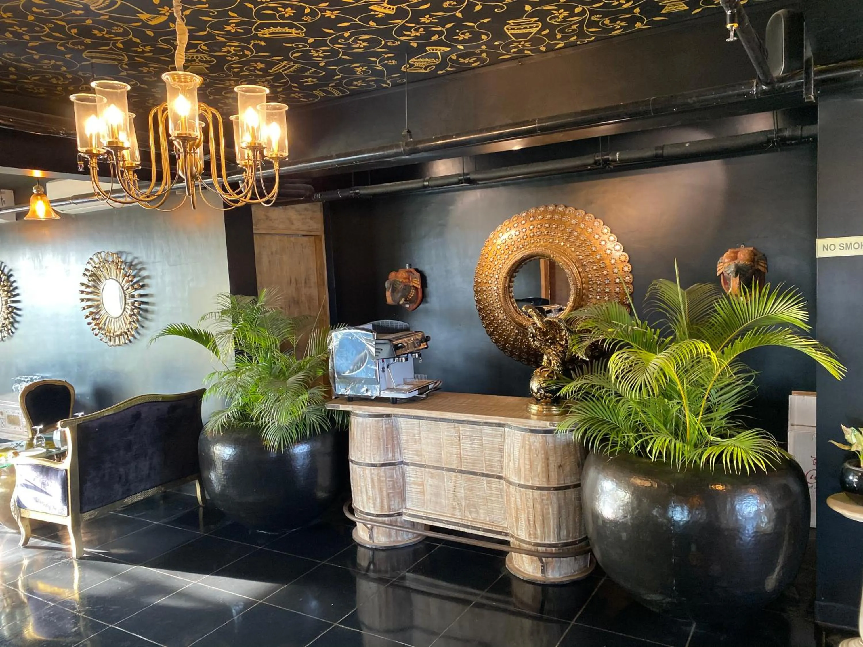 Lounge or bar in The Ramvilas - A Rooftop Pichola Lake View Hotel