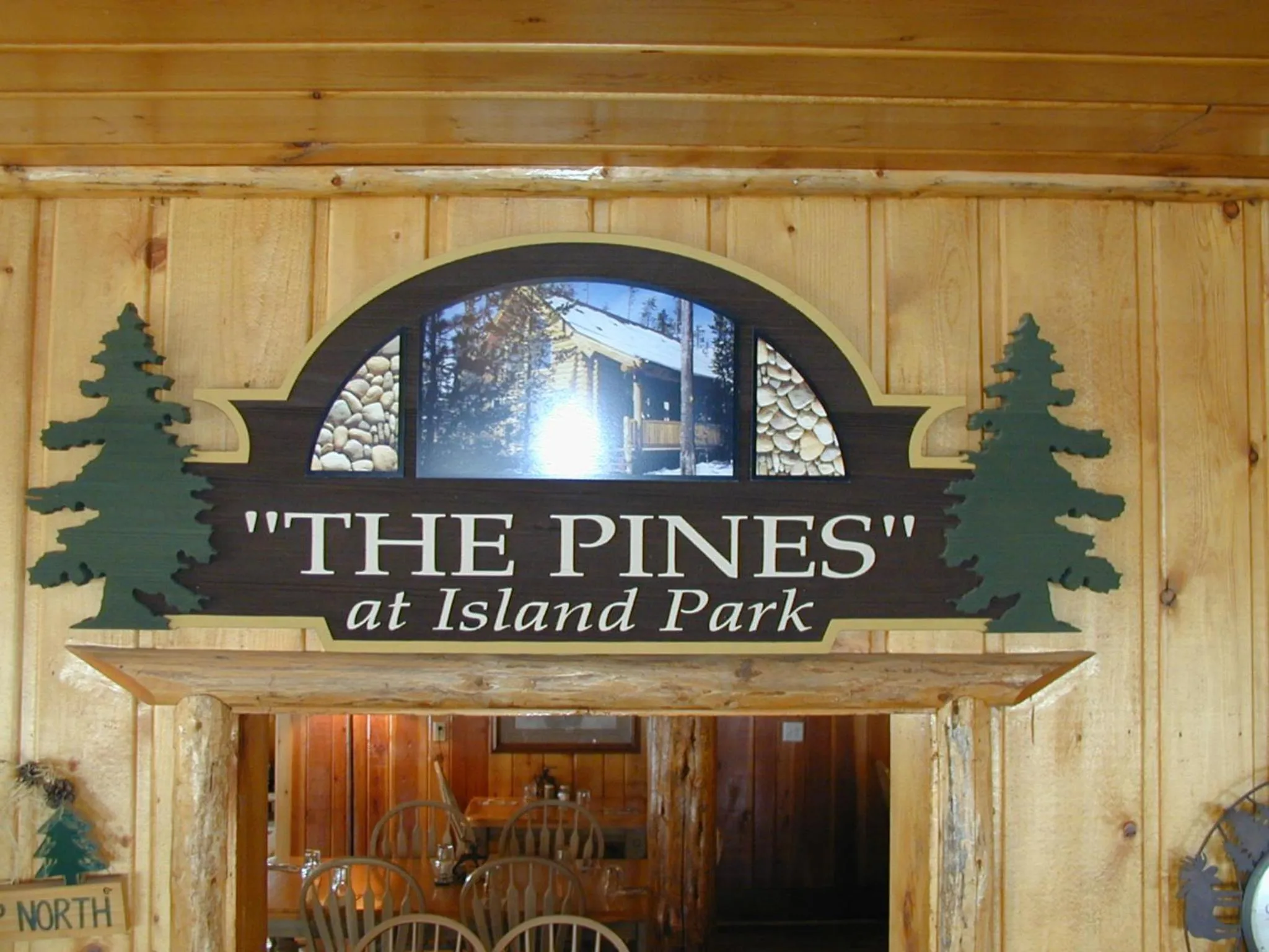 Property logo or sign in The Pines at Island Park