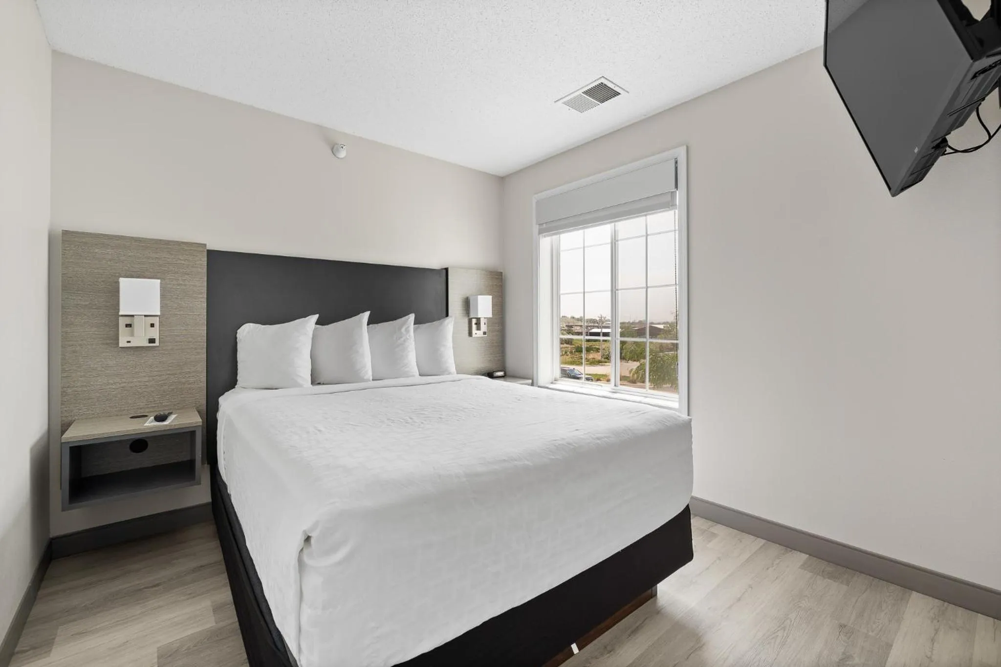 Bed in GrandStay Residential Suites Rapid City