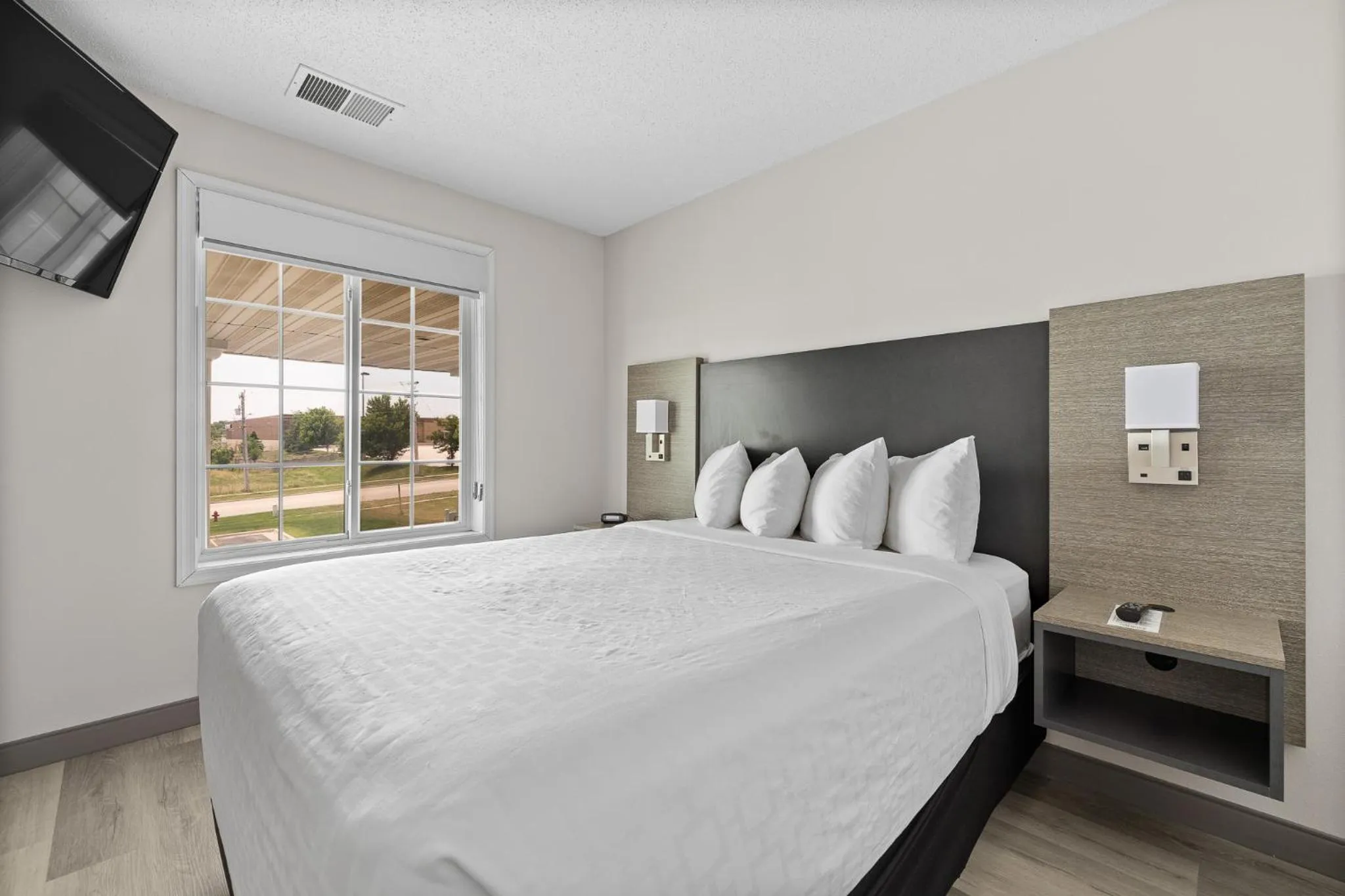 Bed in GrandStay Residential Suites Rapid City
