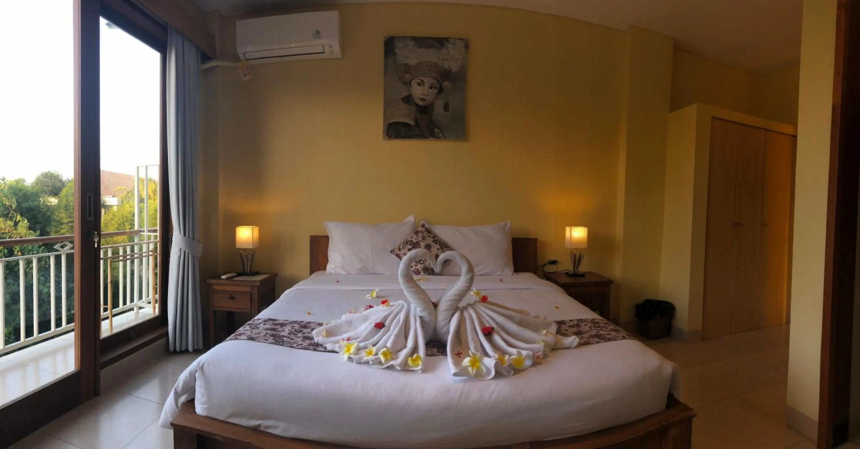 Bed in Oka's Guest House Canggu