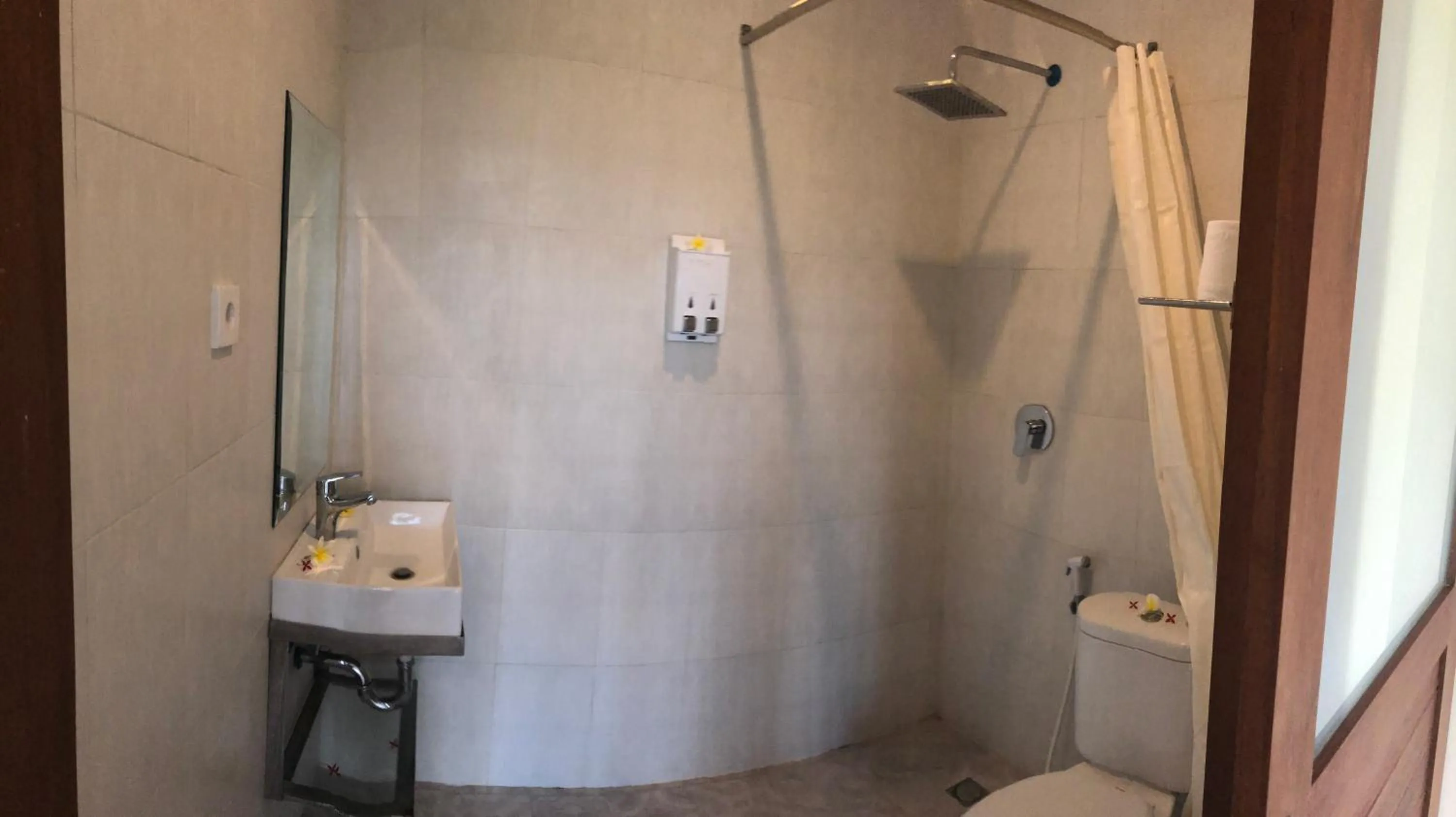 Shower in Oka's Guest House Canggu