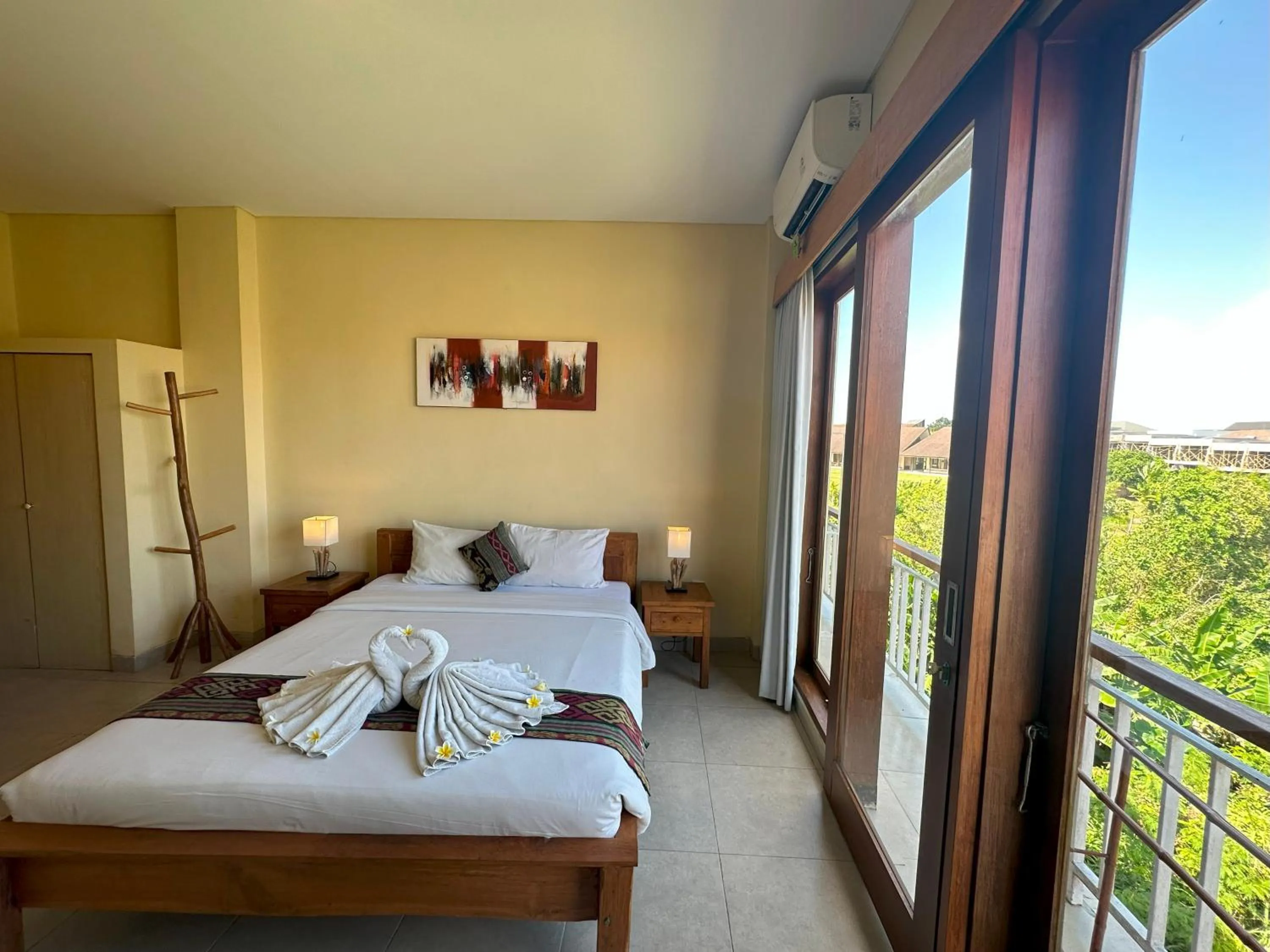 Bed in Oka's Guest House Canggu