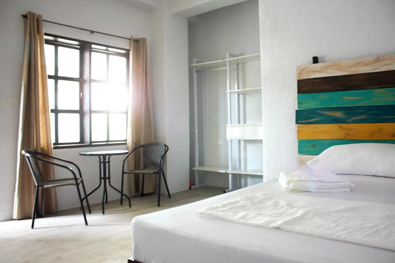 Living room, Bed in Sentro Suites Siargao