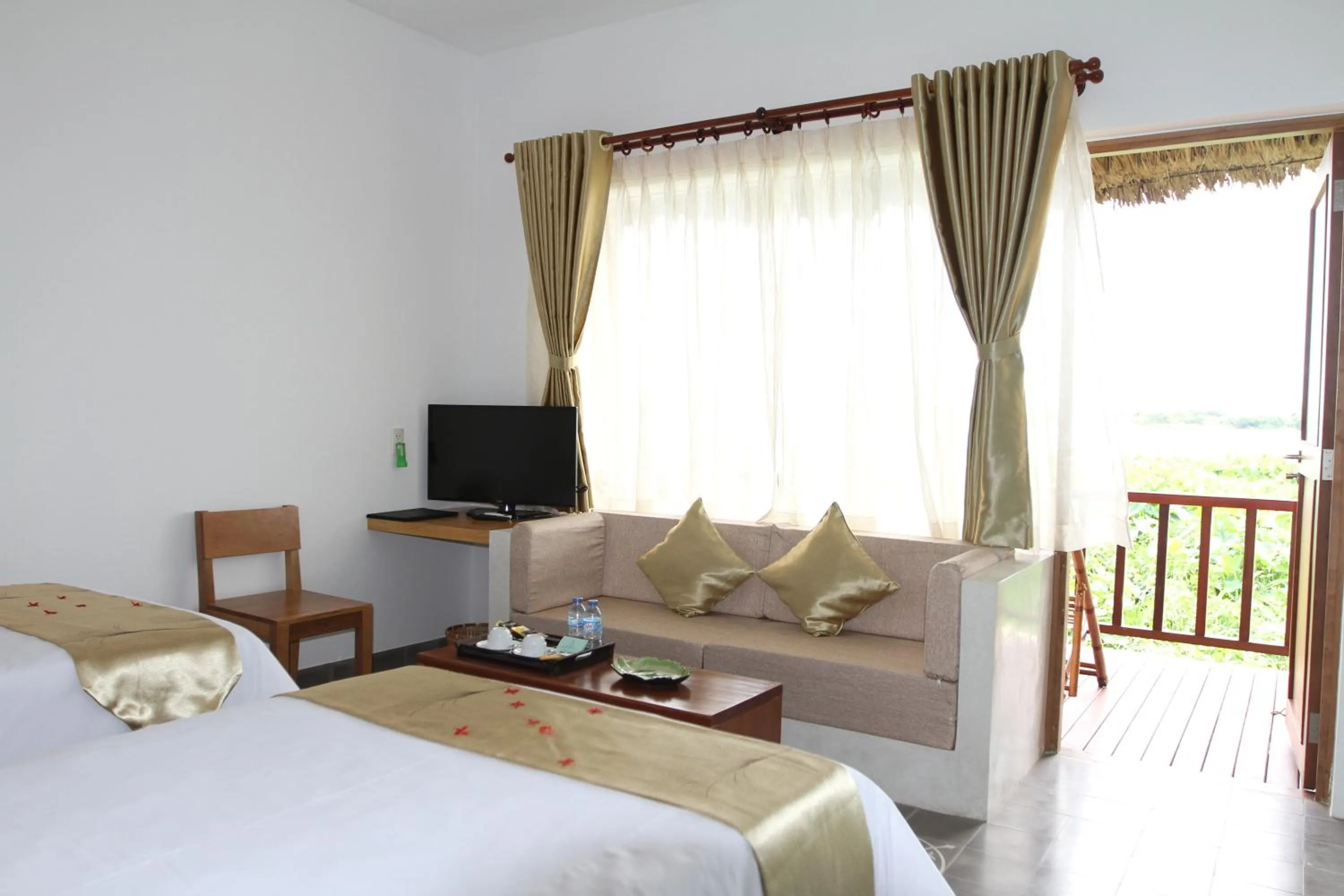 Photo of the whole room, Bed in Mekong Riverside Boutique Resort & Spa