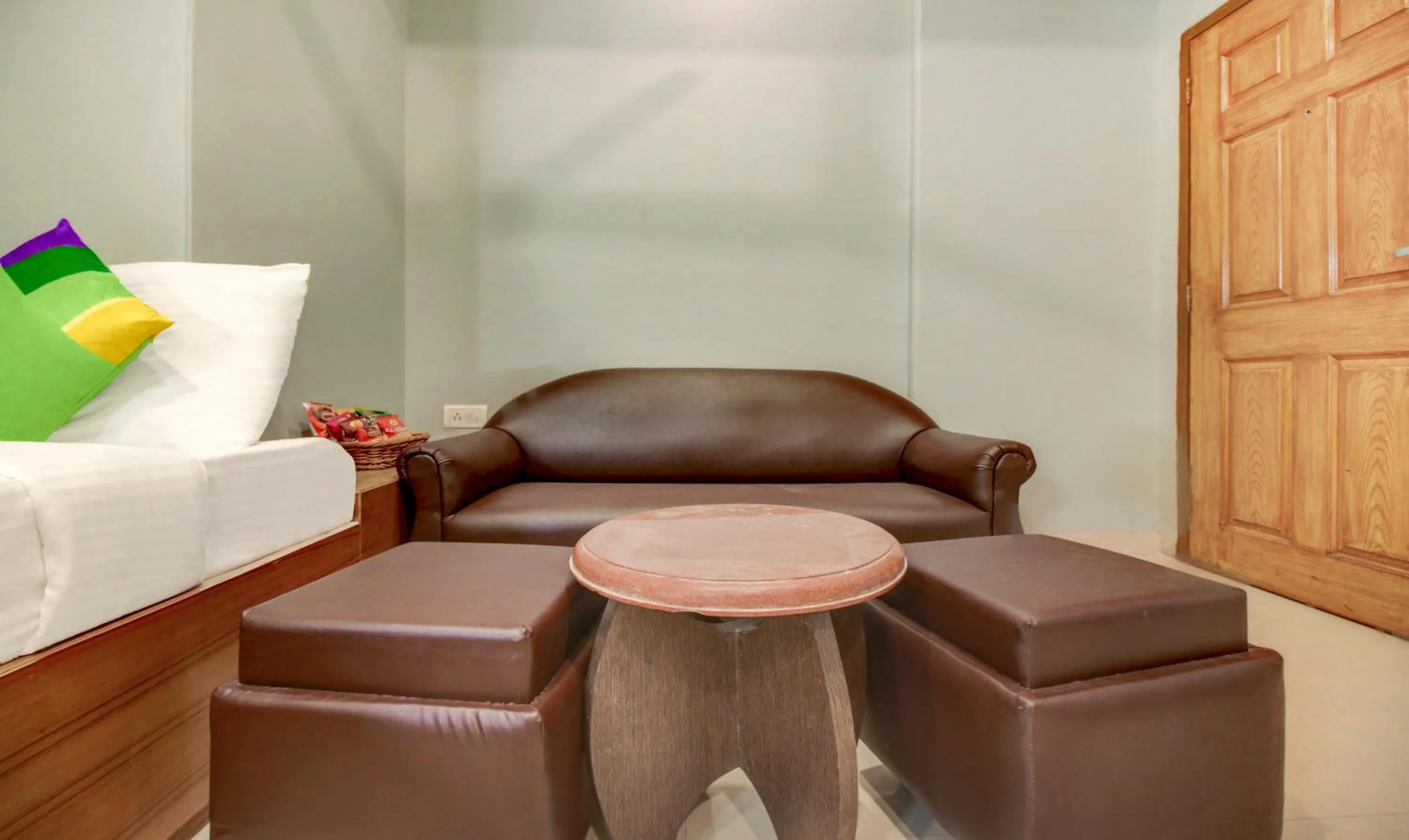 Seating area in Treebo Cruz Royale Santacruz West