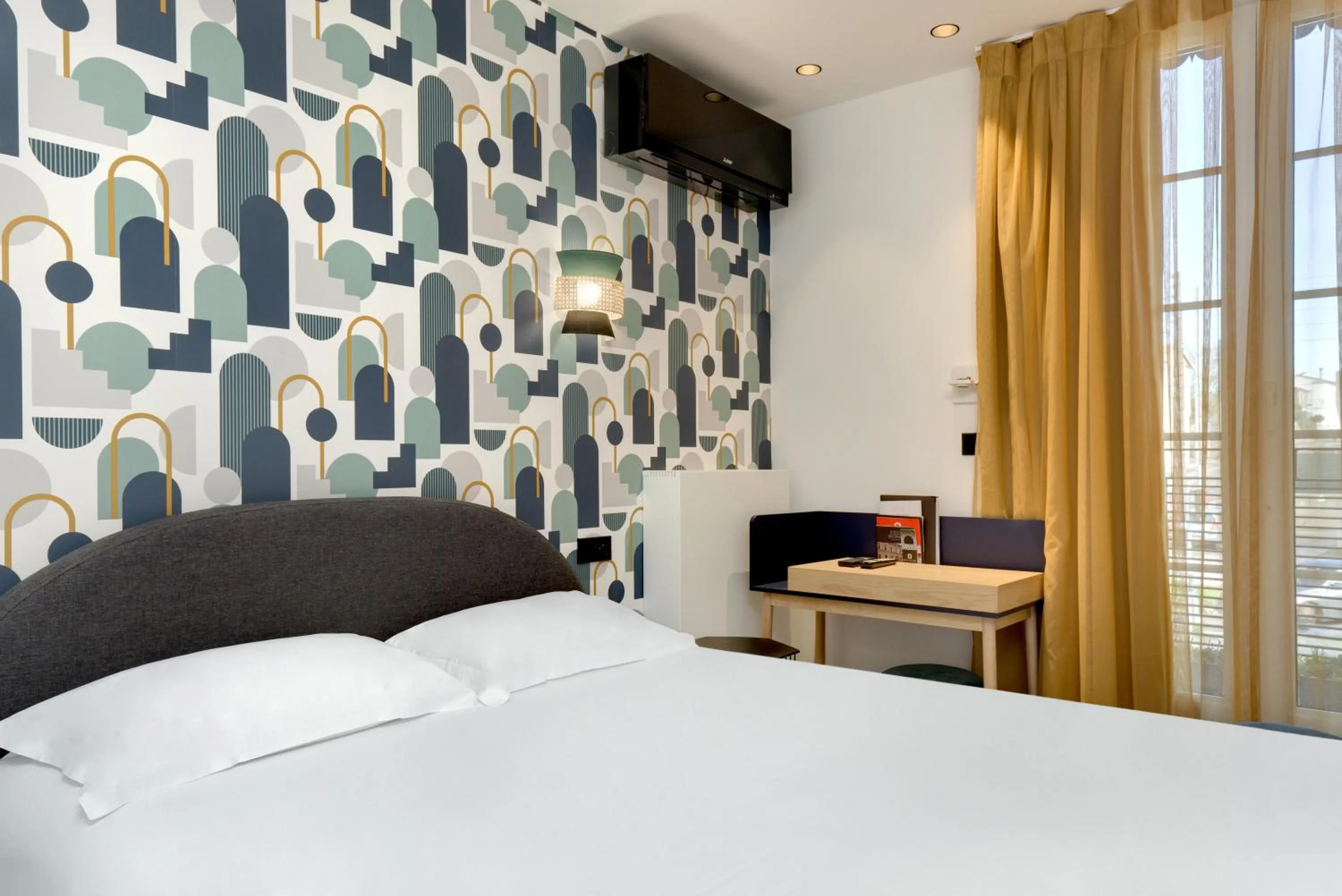 Bed in Hôtel De L'octroi