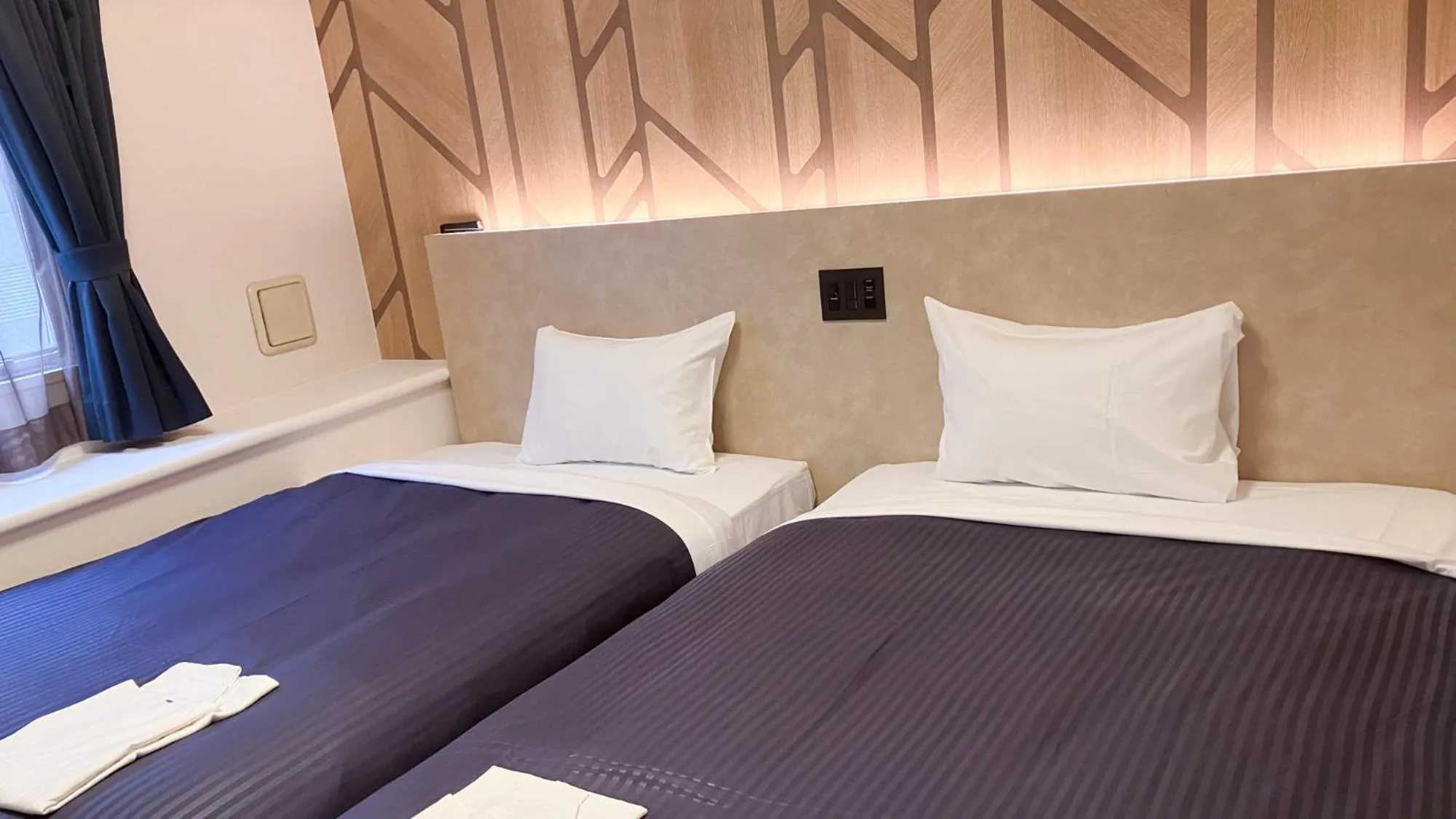 Bed in HOTEL LiVEMAX BUDGET Shinbashi