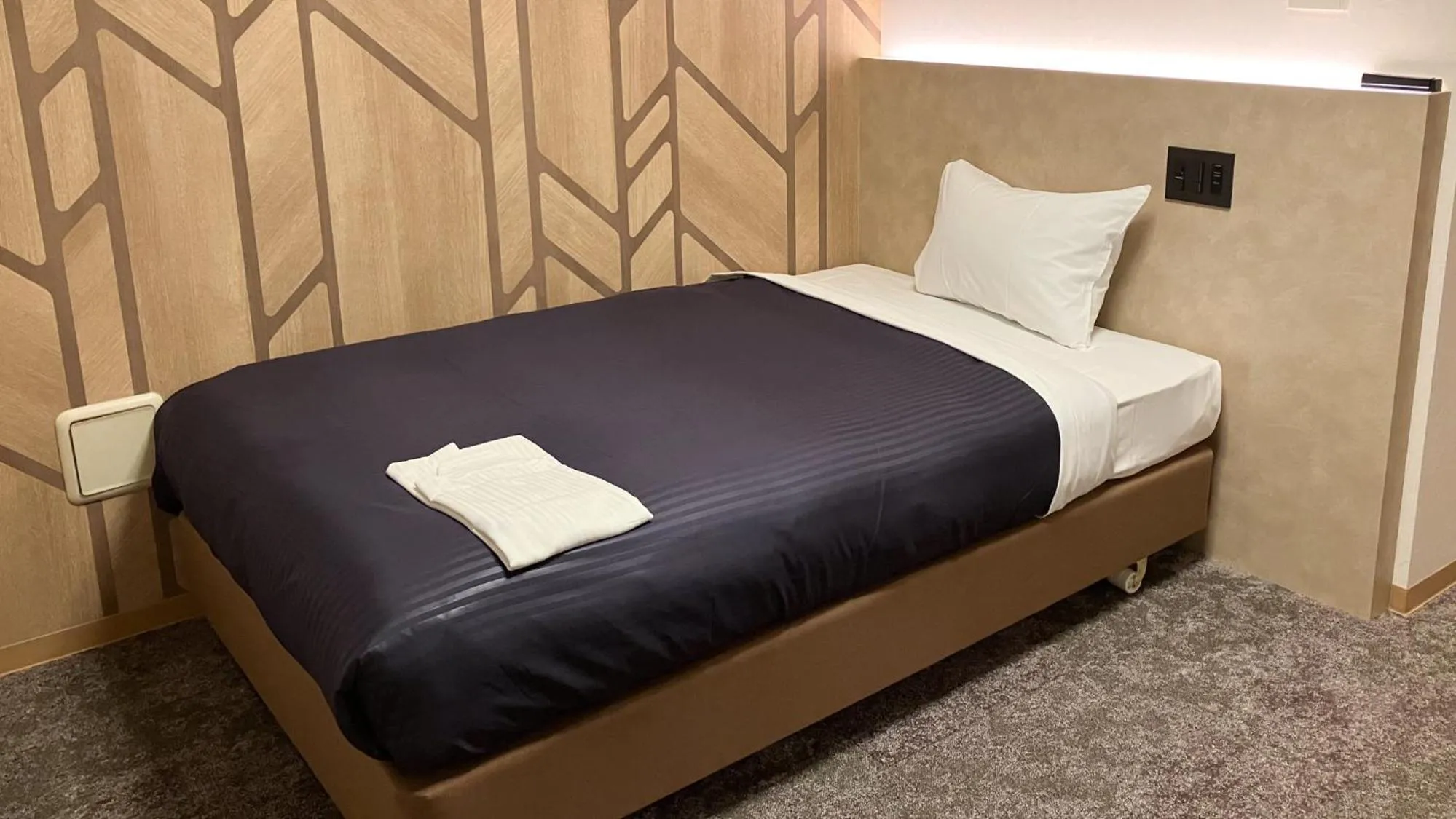 Bed in HOTEL LiVEMAX BUDGET Shinbashi