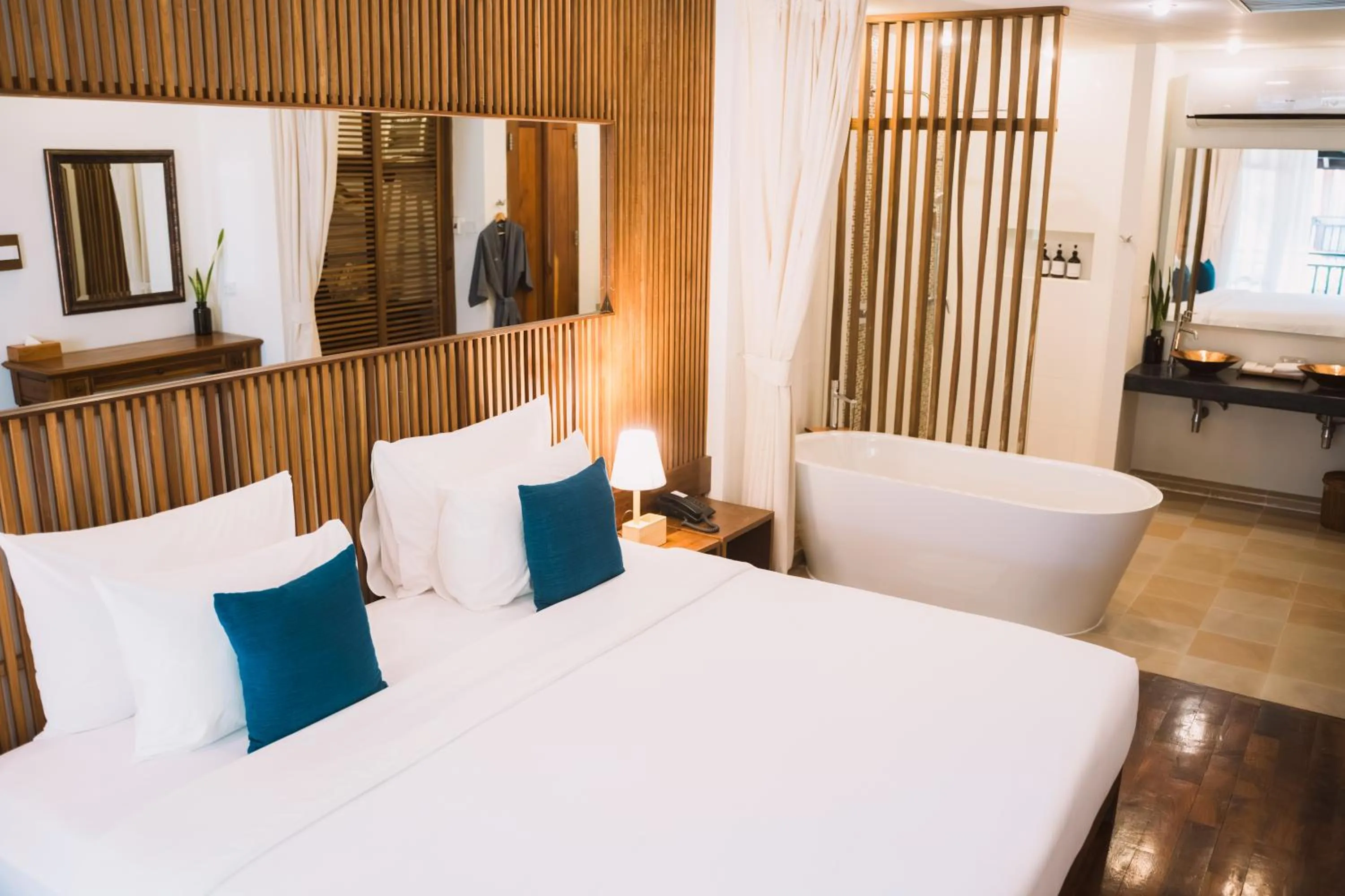 Bed in Le Sen Boutique Hotel