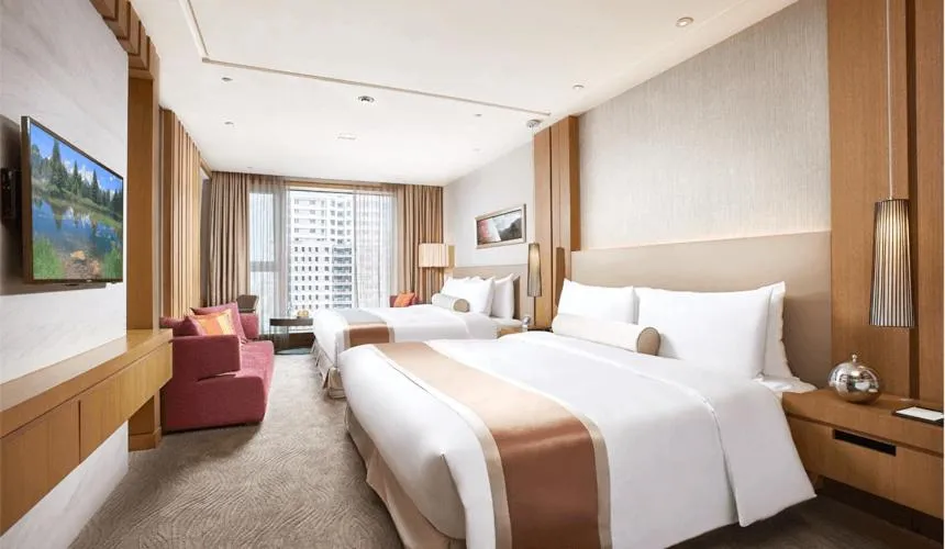 Photo of the whole room, Bed in Millennium Hotel Taichung