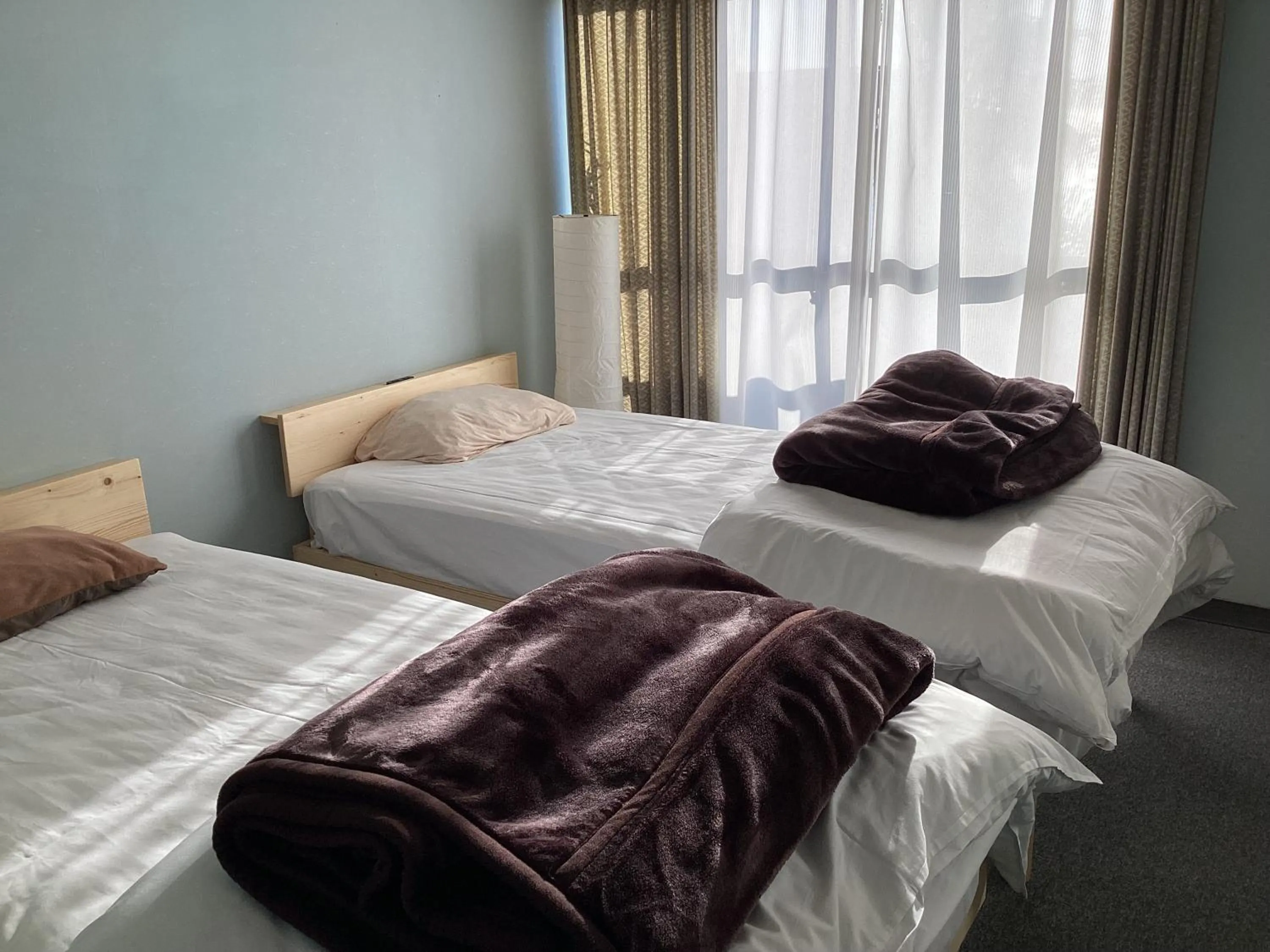 Bed in Katsuura Seaside Hotel Apartment-type hotel without kitchen