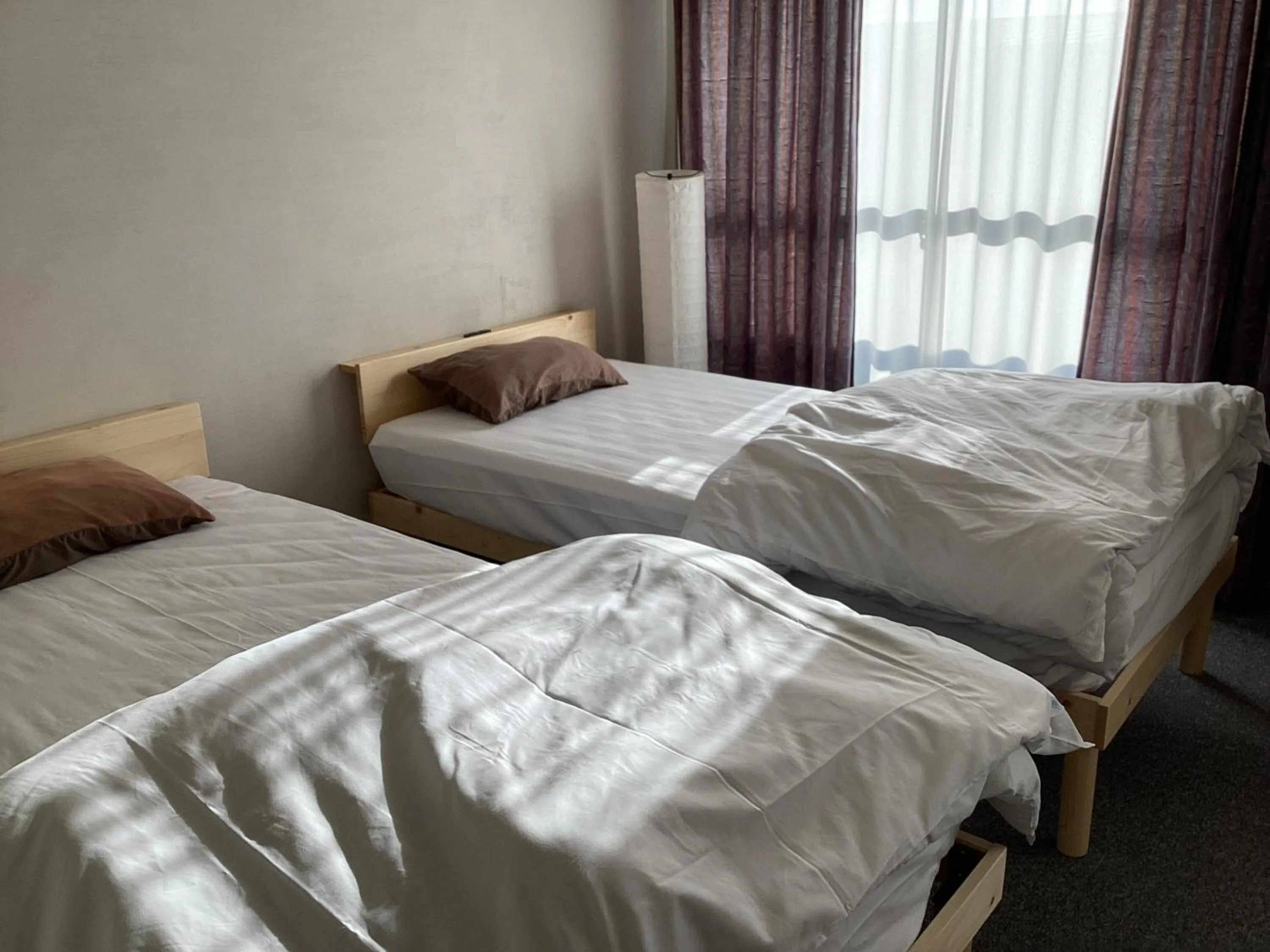 Bed in Katsuura Seaside Hotel Apartment-type hotel without kitchen