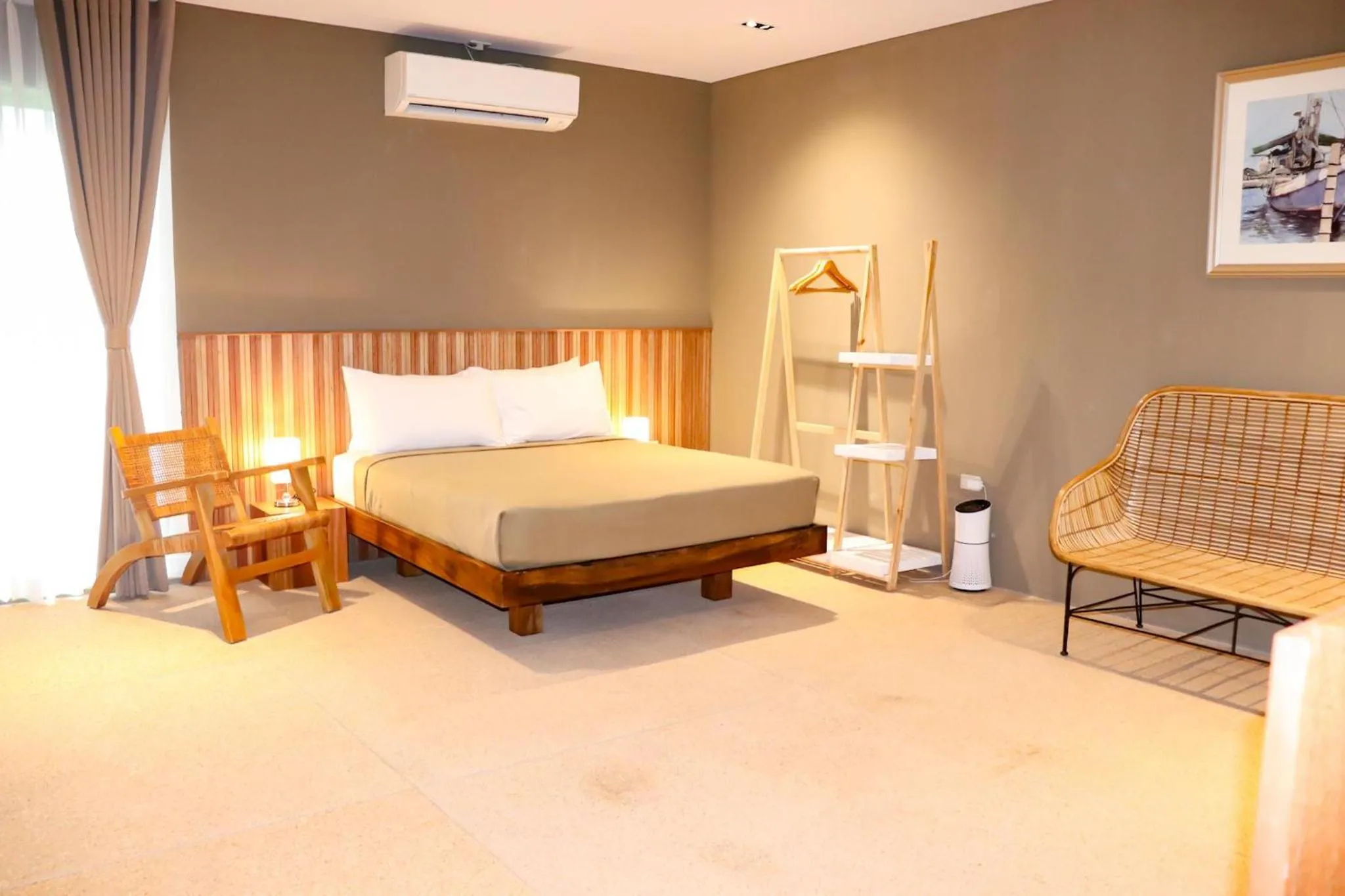 Seating area, Bed in Cala Laiya