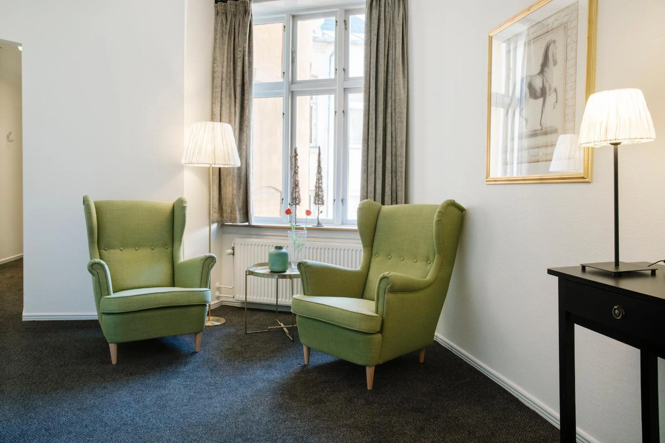 Communal lounge/ TV room in Hotel Tiffany