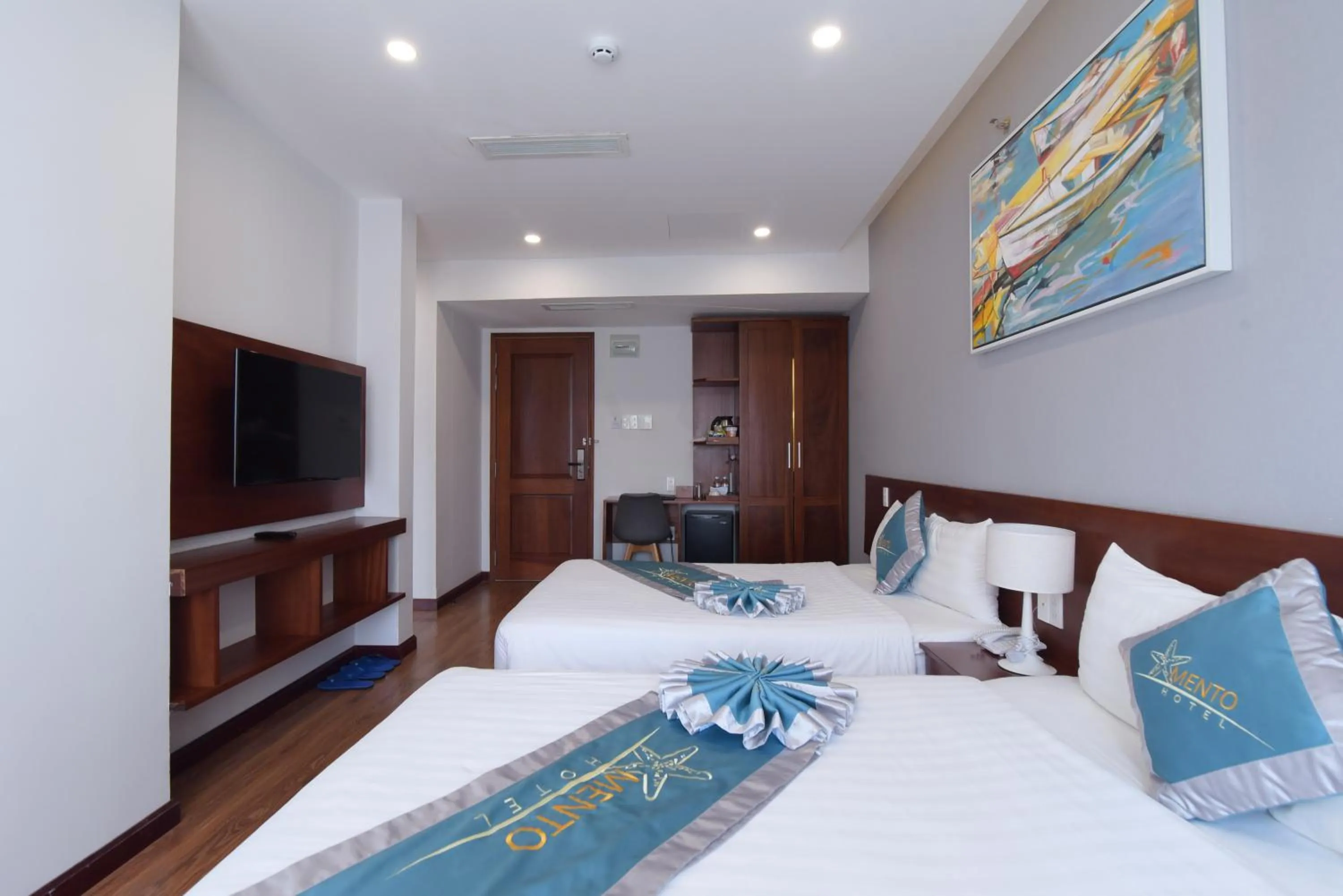 Bed in MENTO HOTEL QUY NHƠN