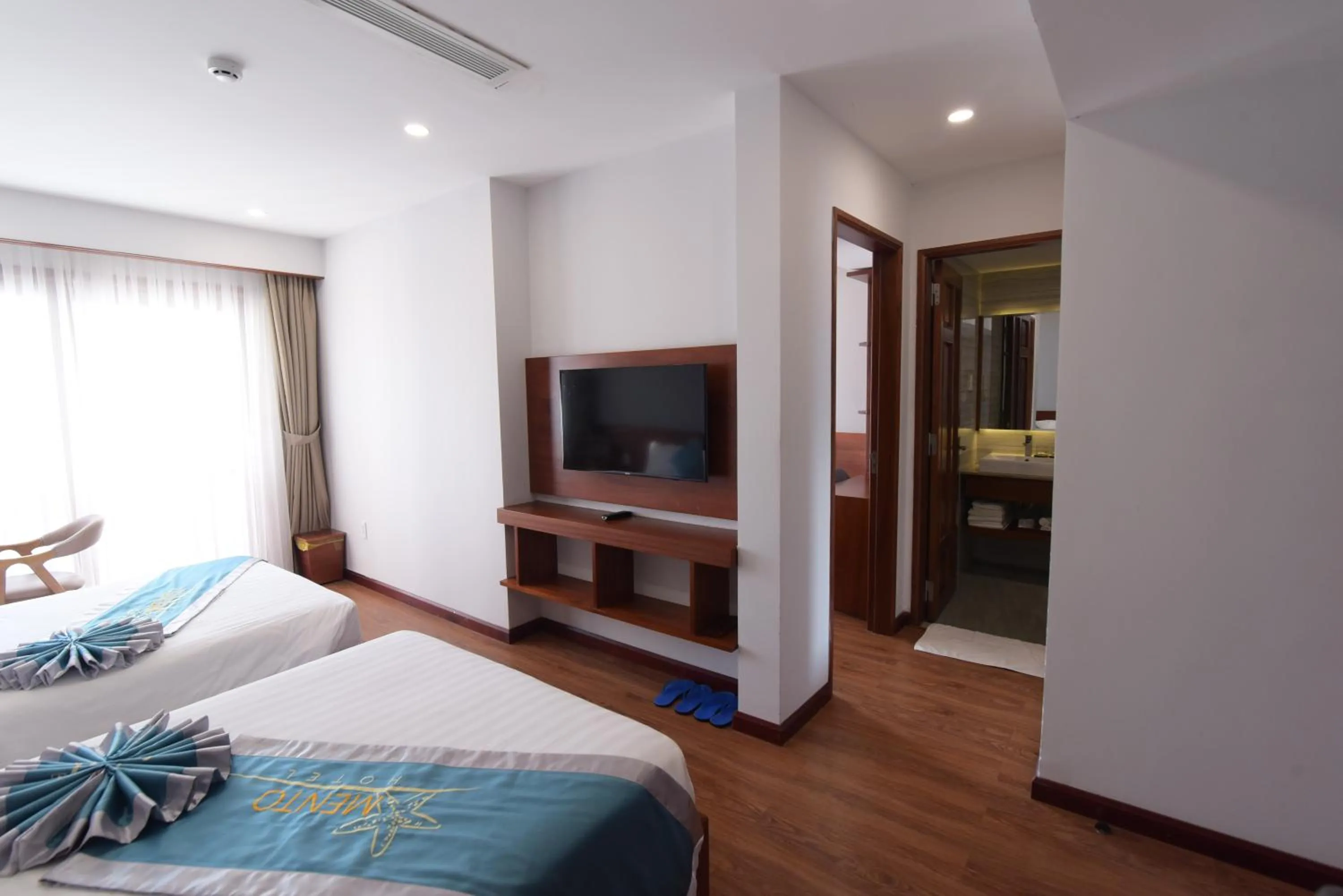 Bed in MENTO HOTEL QUY NHƠN