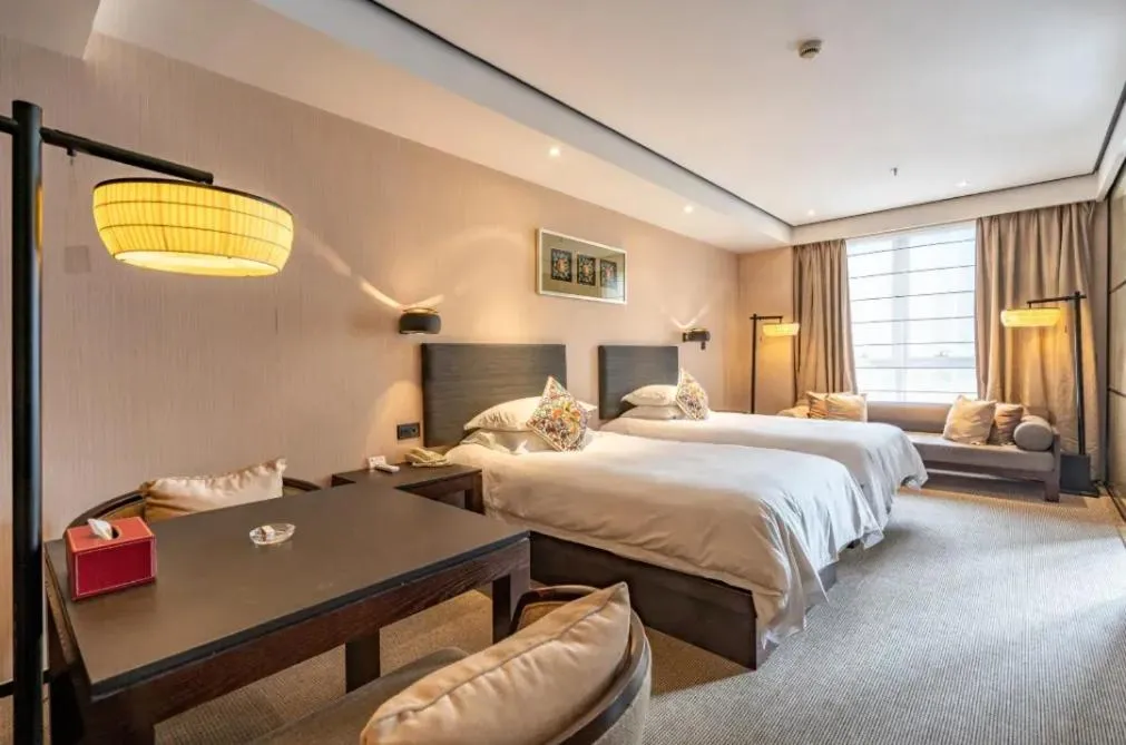 Photo of the whole room, Bed in SSAW Boutique Hotel Hangzhou Xiaoshan Yinlong Hangfachang Subway