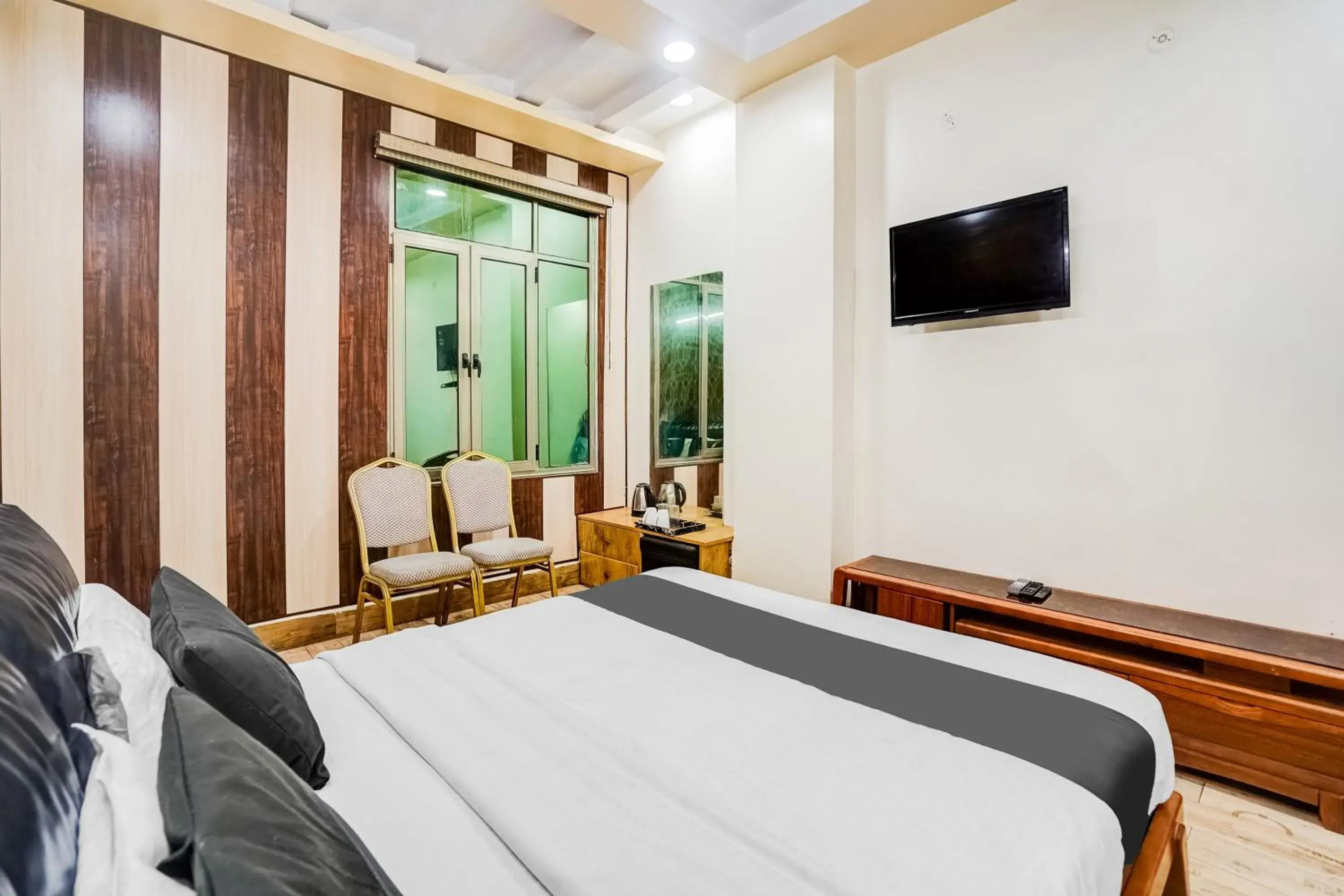Classic Triple Room - single occupancy in Super Townhouse Keshavpuram formerly Shree Pushpraj Classic Triple Room - single occupancy in Super Townhouse Keshavpuram formerly Shree Pushpraj