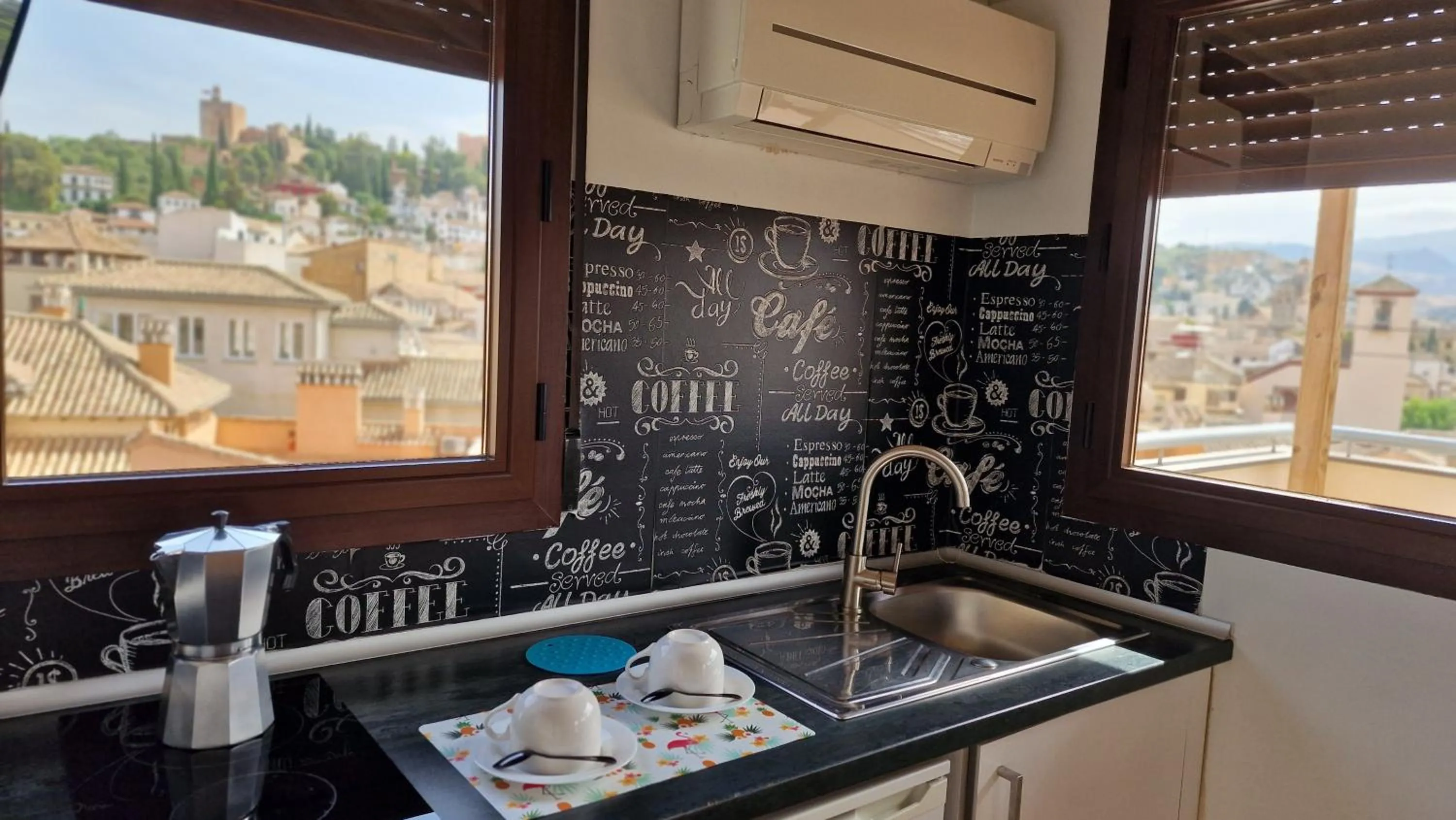 Kitchen or kitchenette in Imeda Apartamentos Escudo del Carmen 19