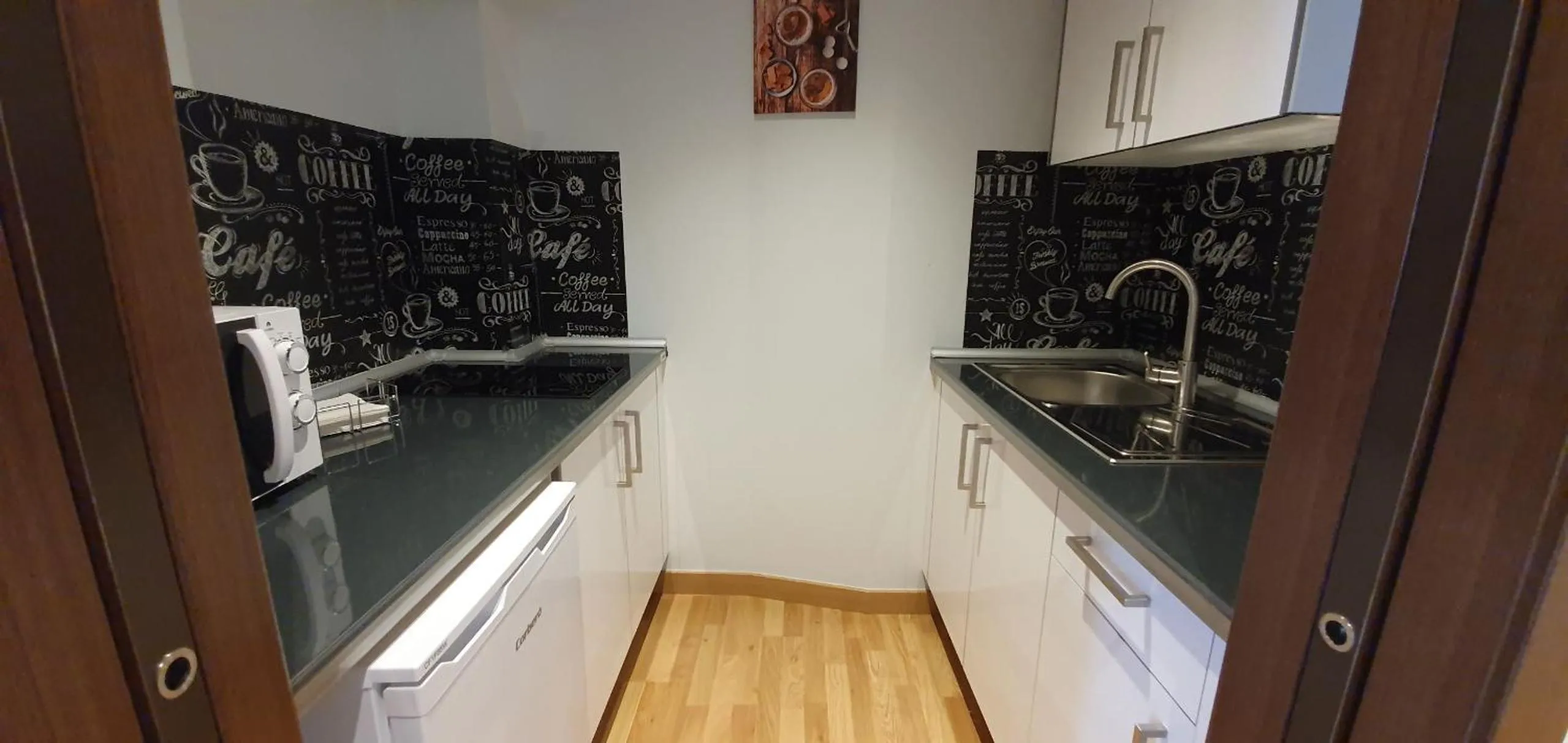 Kitchen or kitchenette in Imeda Apartamentos Escudo del Carmen 19